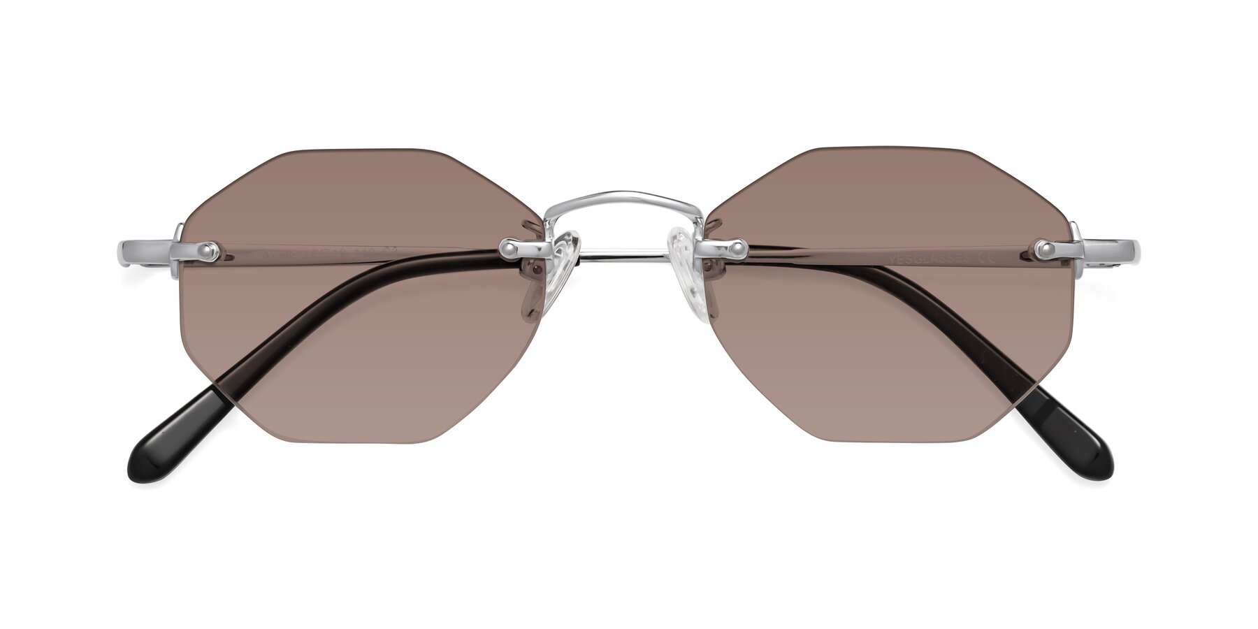 Folded Front of Ayele in Silver with Medium Brown Tinted Lenses