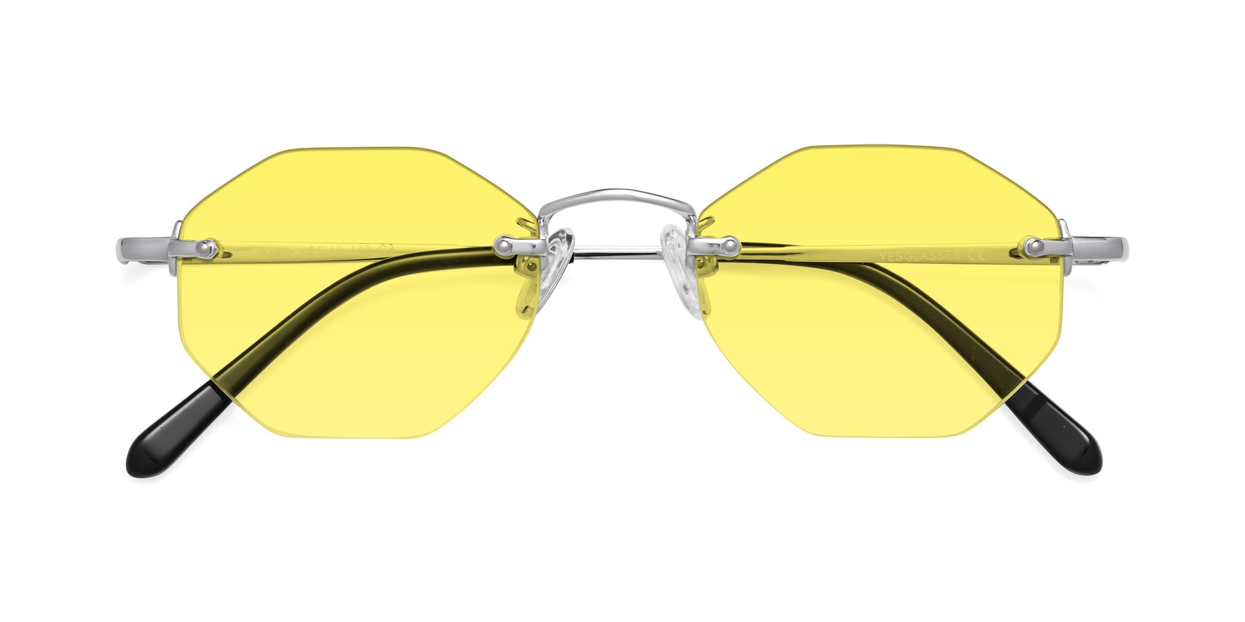 Folded Front of Ayele in Silver with Medium Yellow Tinted Lenses