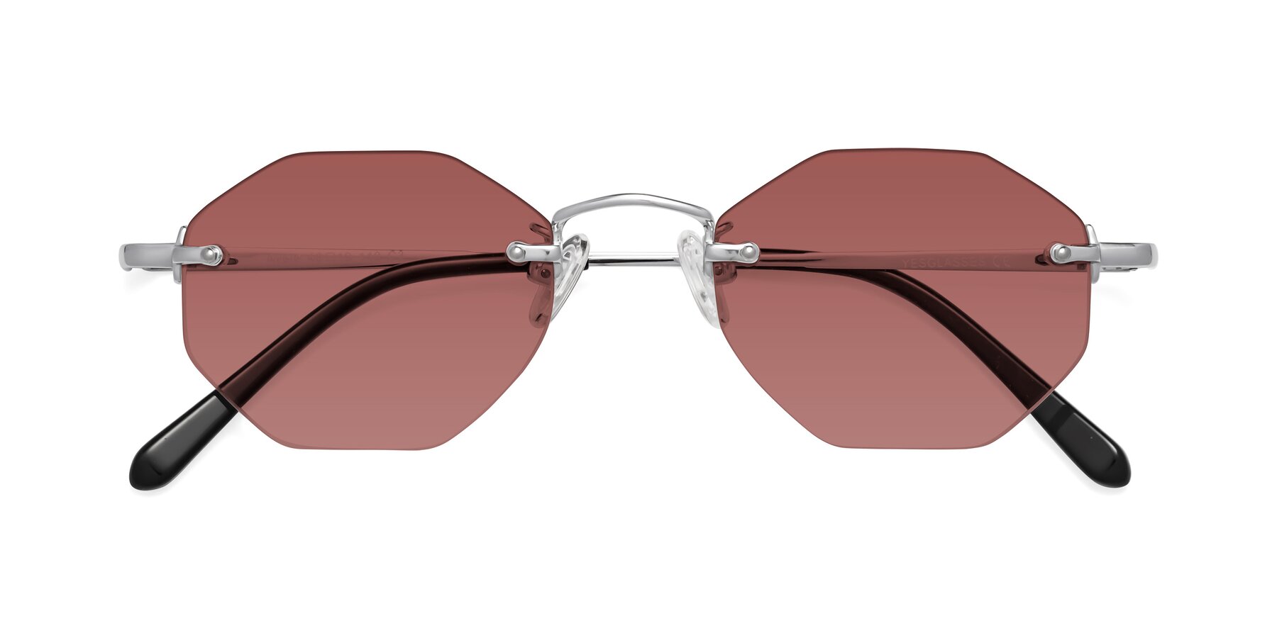 Folded Front of Ayele in Silver with Garnet Tinted Lenses