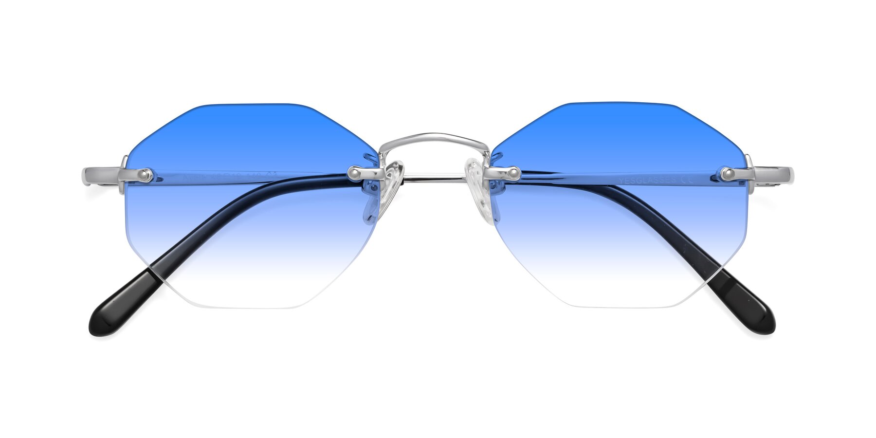 Folded Front of Ayele in Silver with Blue Gradient Lenses