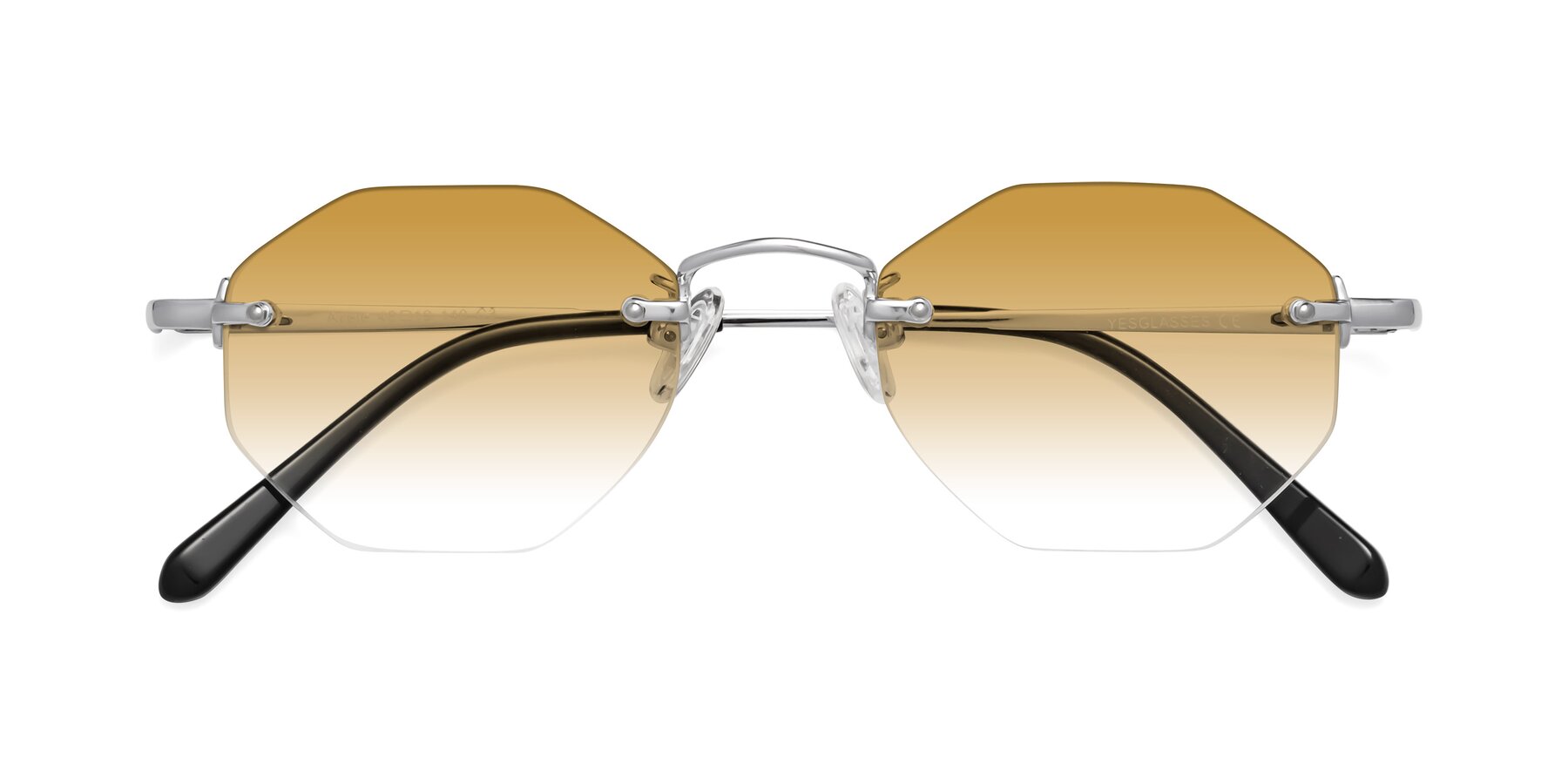 Folded Front of Ayele in Silver with Champagne Gradient Lenses