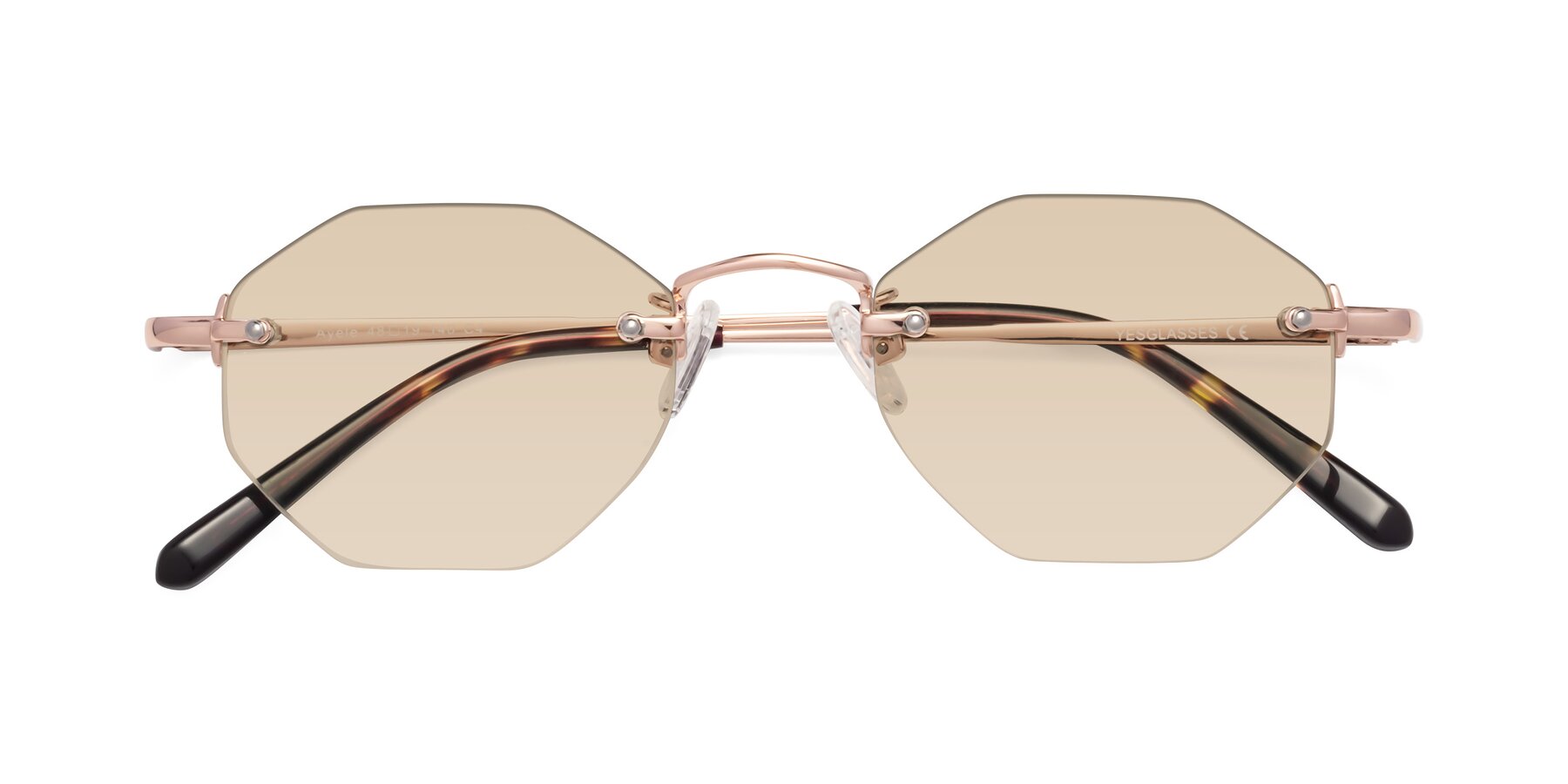 Folded Front of Ayele in Rose Gold with Light Brown Tinted Lenses