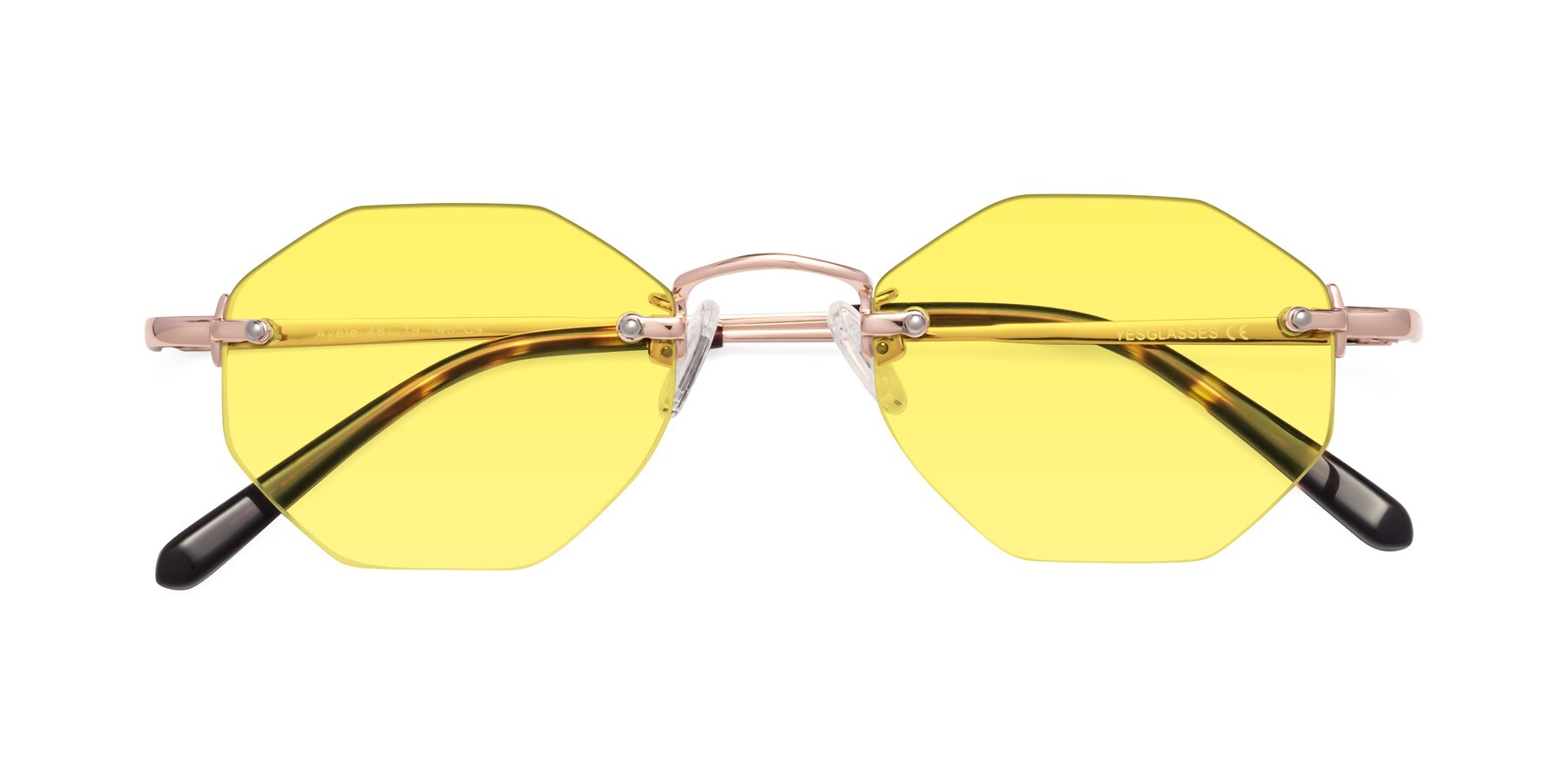 Folded Front of Ayele in Rose Gold with Medium Yellow Tinted Lenses