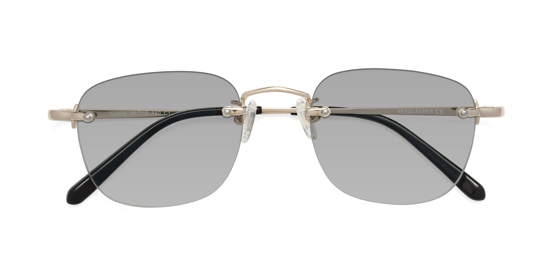 Folded Front of Leslie in Light Gold with Light Gray Tinted Lenses