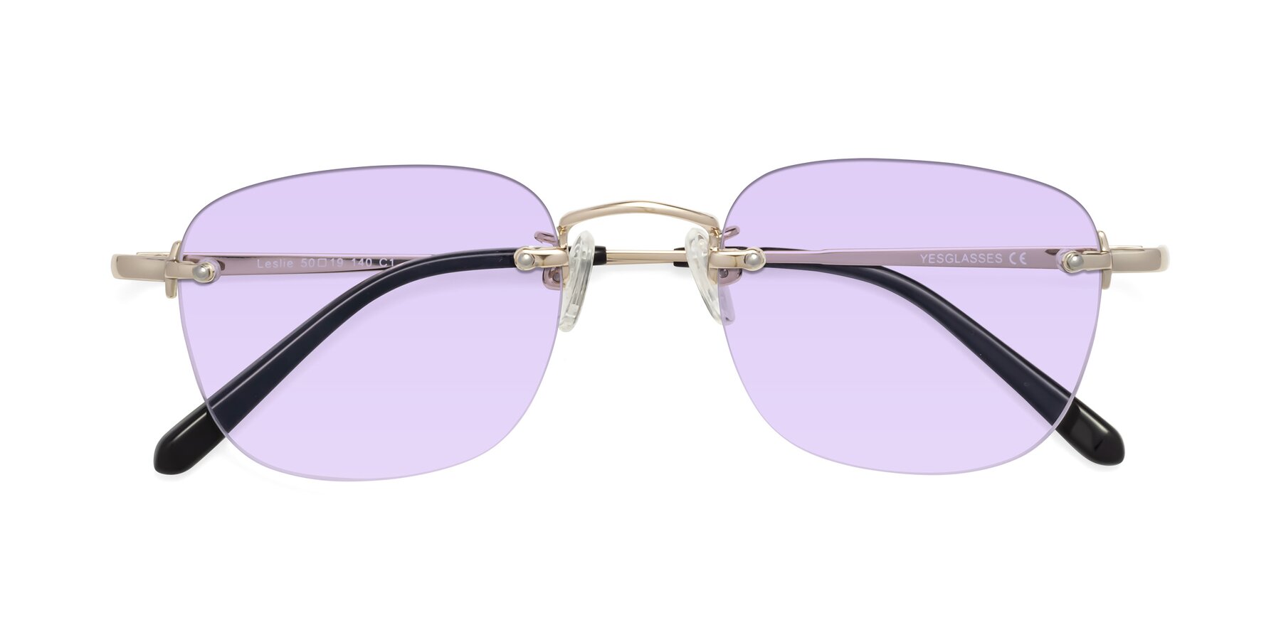 Folded Front of Leslie in Light Gold with Light Purple Tinted Lenses