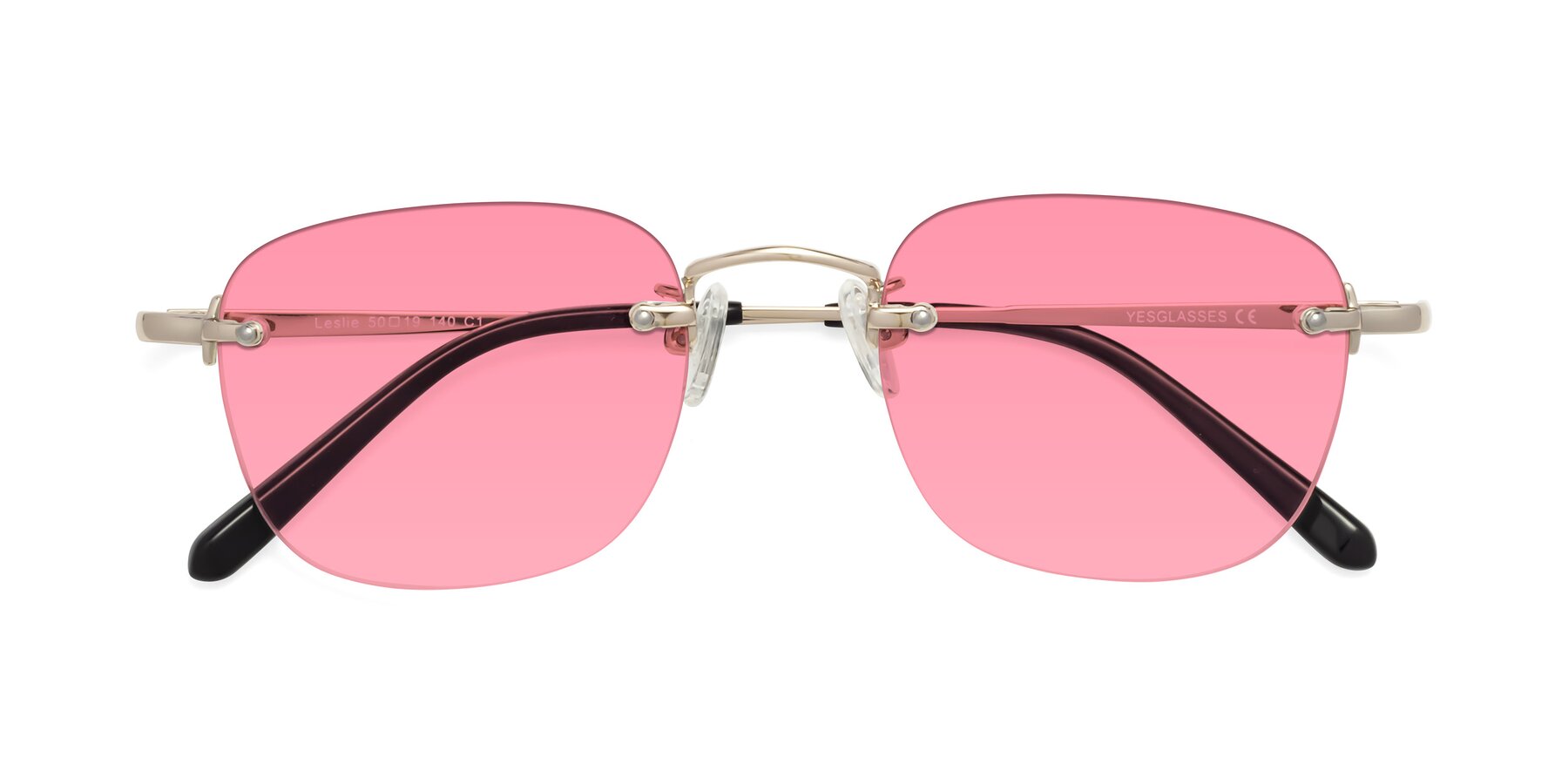 Folded Front of Leslie in Light Gold with Pink Tinted Lenses