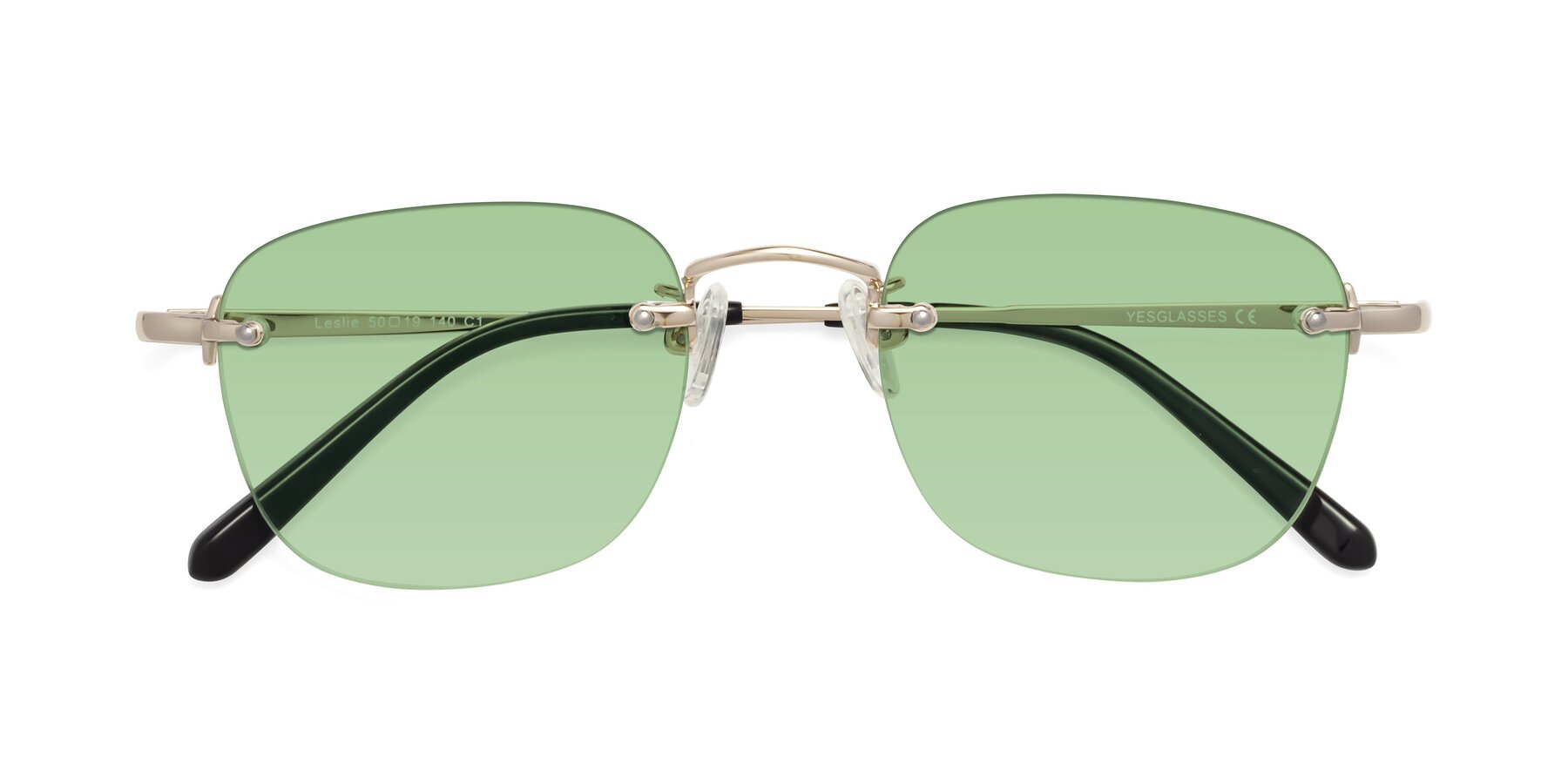 Folded Front of Leslie in Light Gold with Medium Green Tinted Lenses