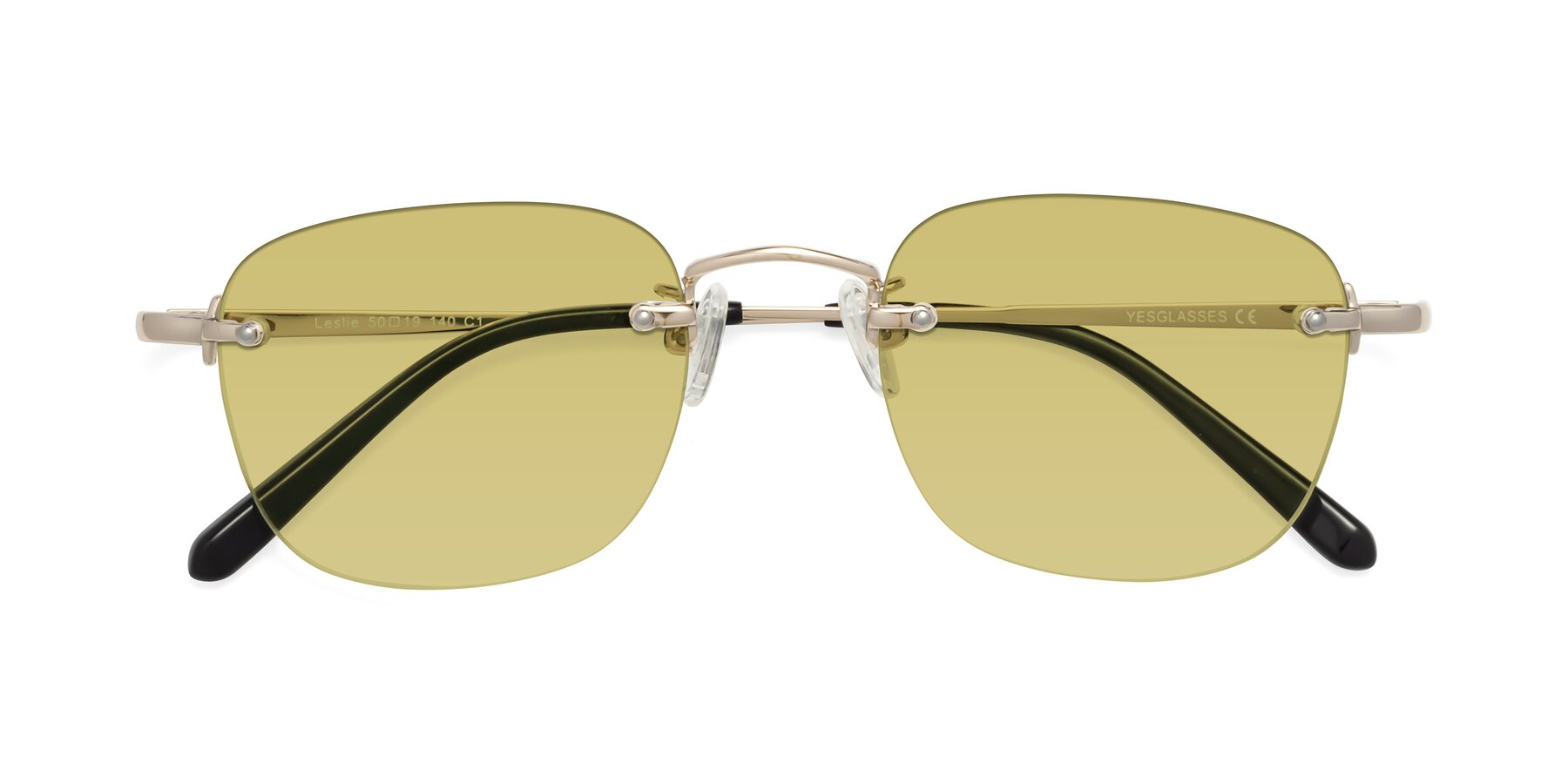 Folded Front of Leslie in Light Gold with Medium Champagne Tinted Lenses