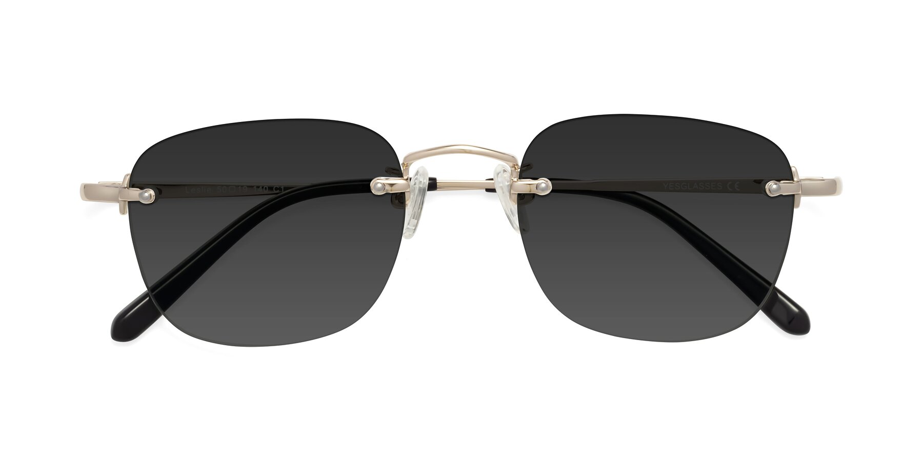 Folded Front of Leslie in Light Gold with Gray Tinted Lenses