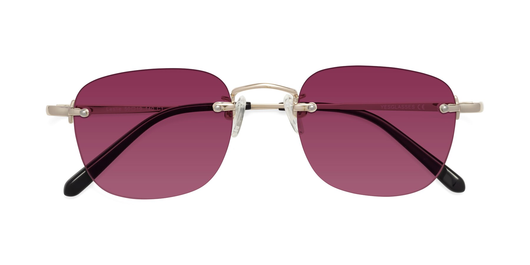 Folded Front of Leslie in Light Gold with Wine Tinted Lenses