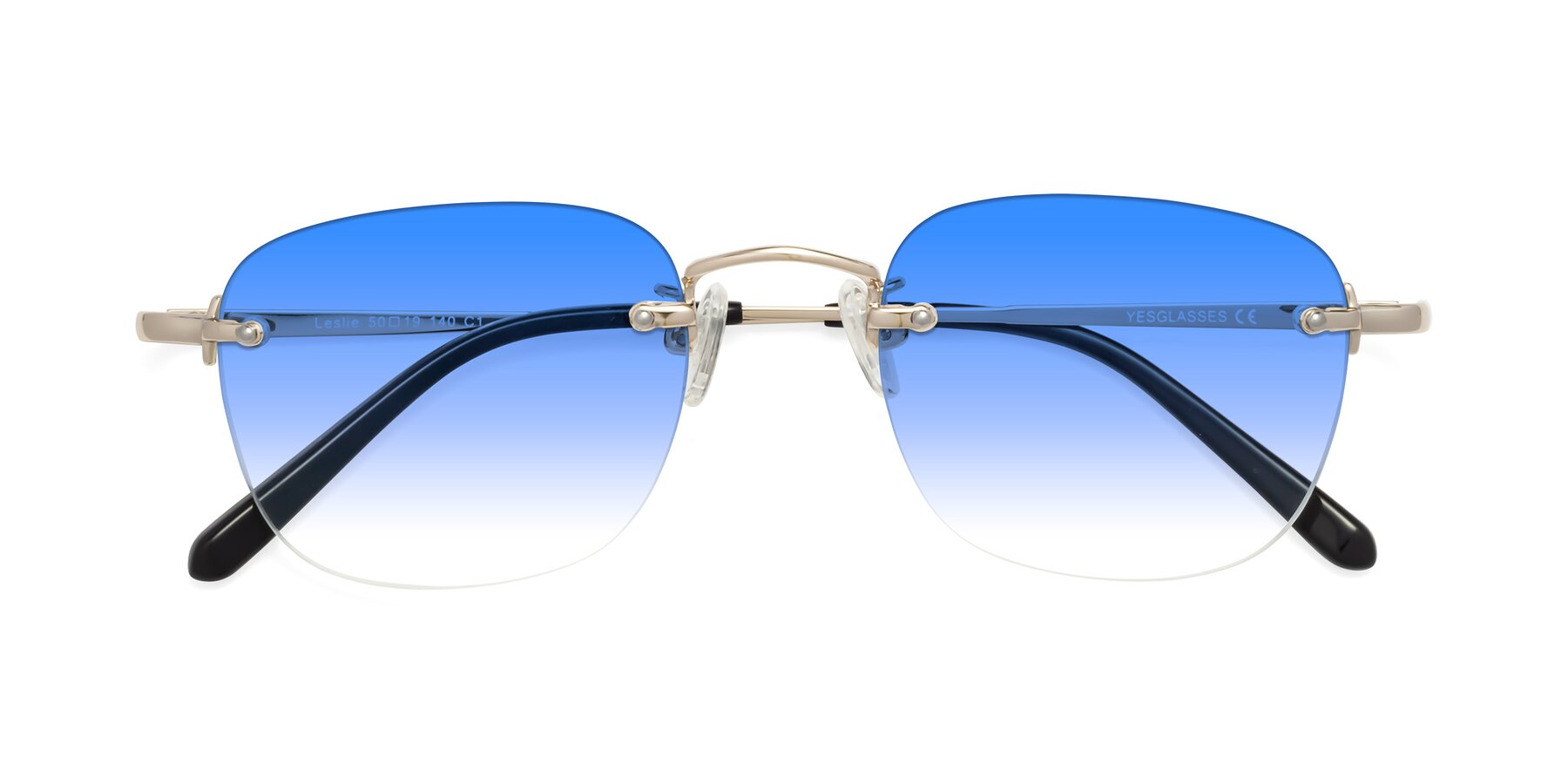 Folded Front of Leslie in Light Gold with Blue Gradient Lenses