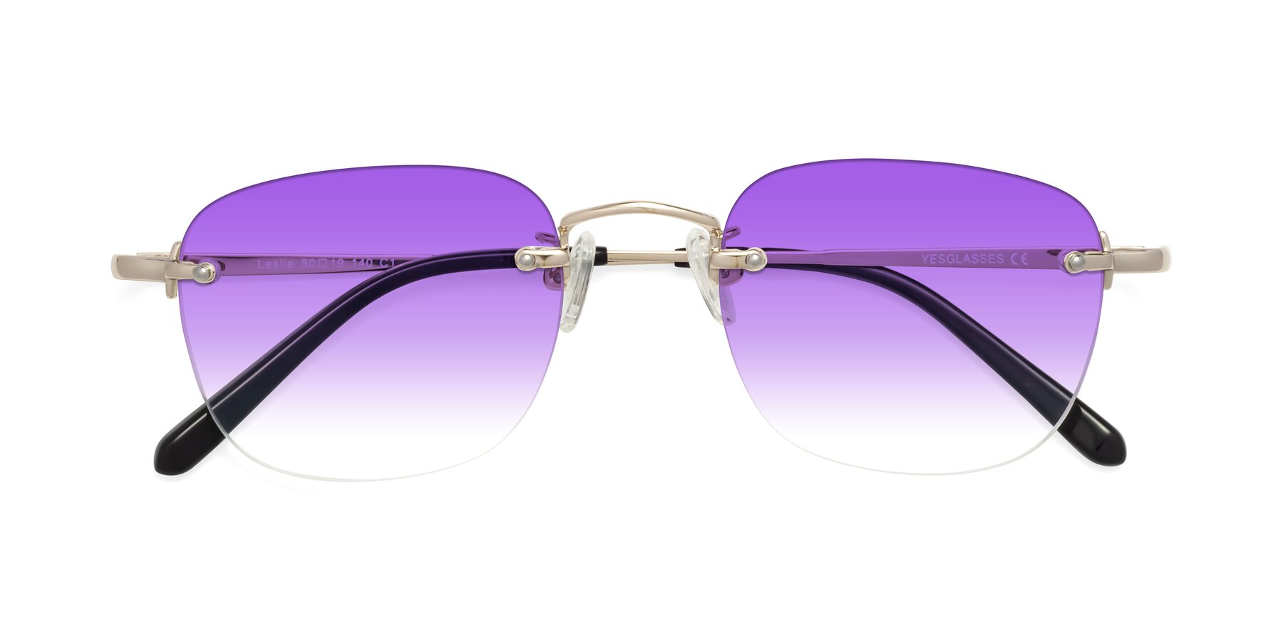 Folded Front of Leslie in Light Gold with Purple Gradient Lenses