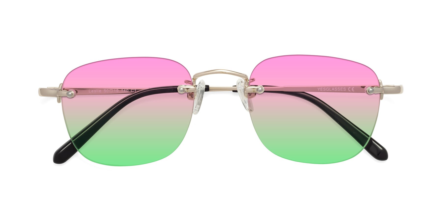 Folded Front of Leslie in Light Gold with Pink / Green Gradient Lenses