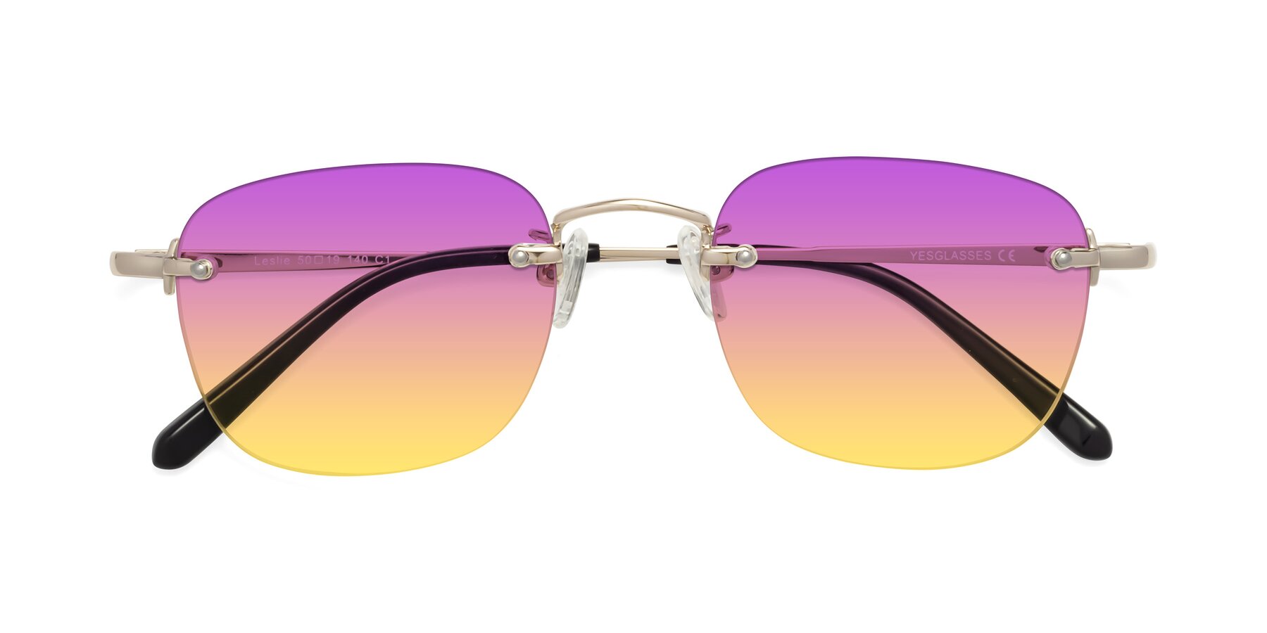 Folded Front of Leslie in Gold with Purple / Yellow Gradient Lenses