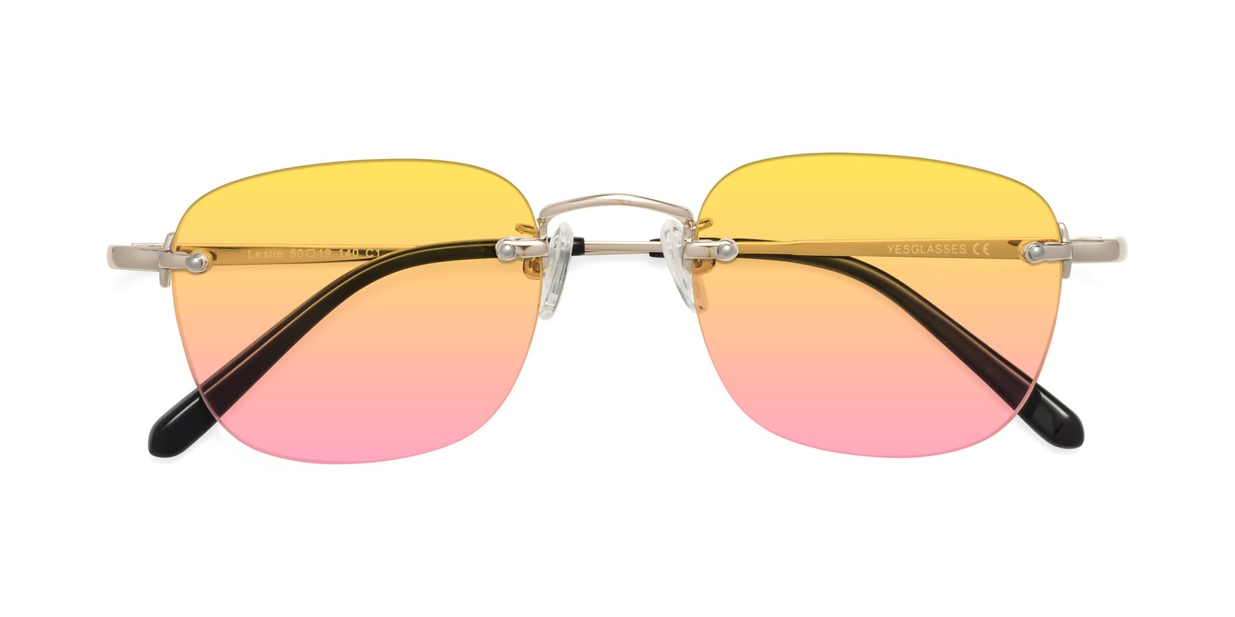 Folded Front of Leslie in Gold with Yellow / Pink Gradient Lenses