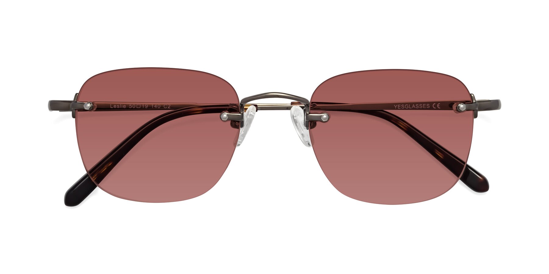 Folded Front of Leslie in Gunmetal with Garnet Tinted Lenses