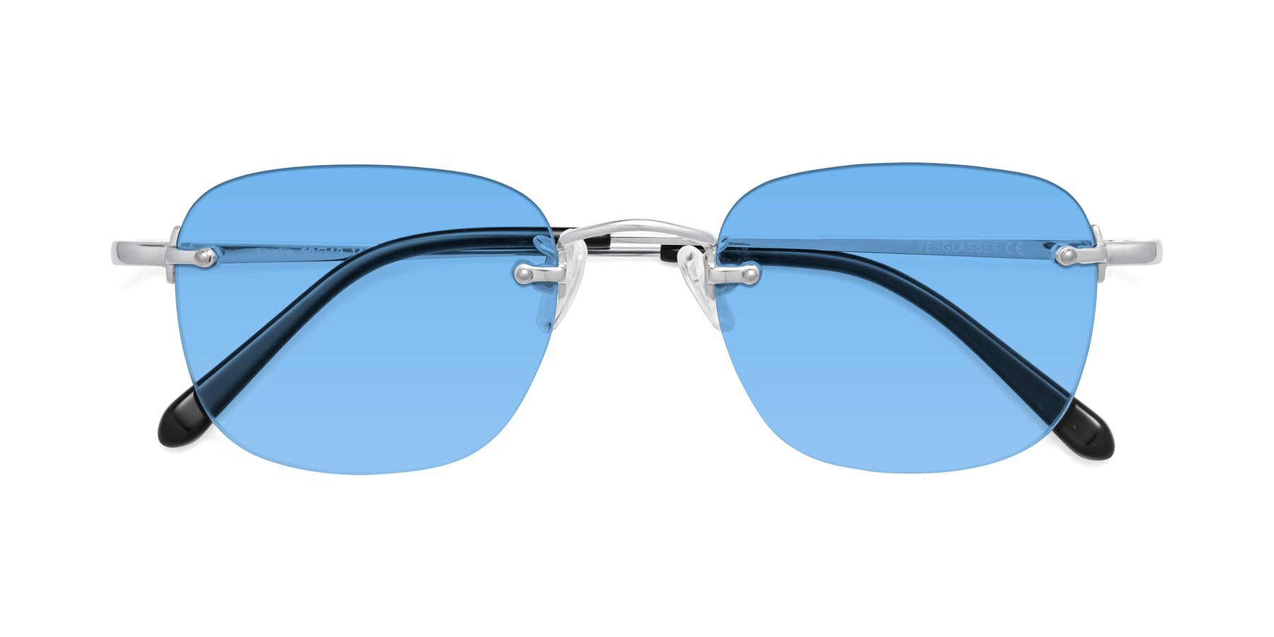 Folded Front of Leslie in Silver with Medium Blue Tinted Lenses
