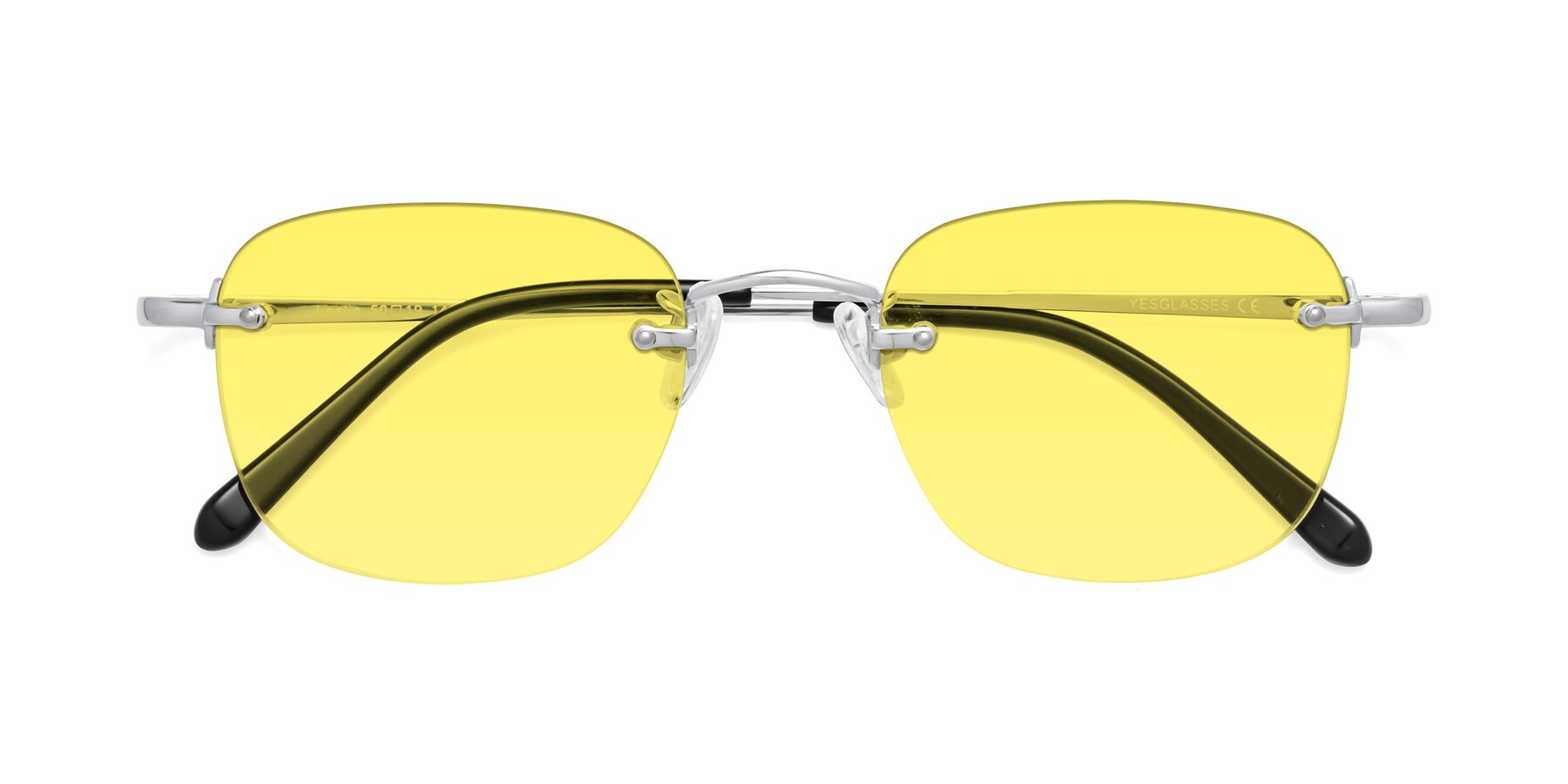 Folded Front of Leslie in Silver with Medium Yellow Tinted Lenses