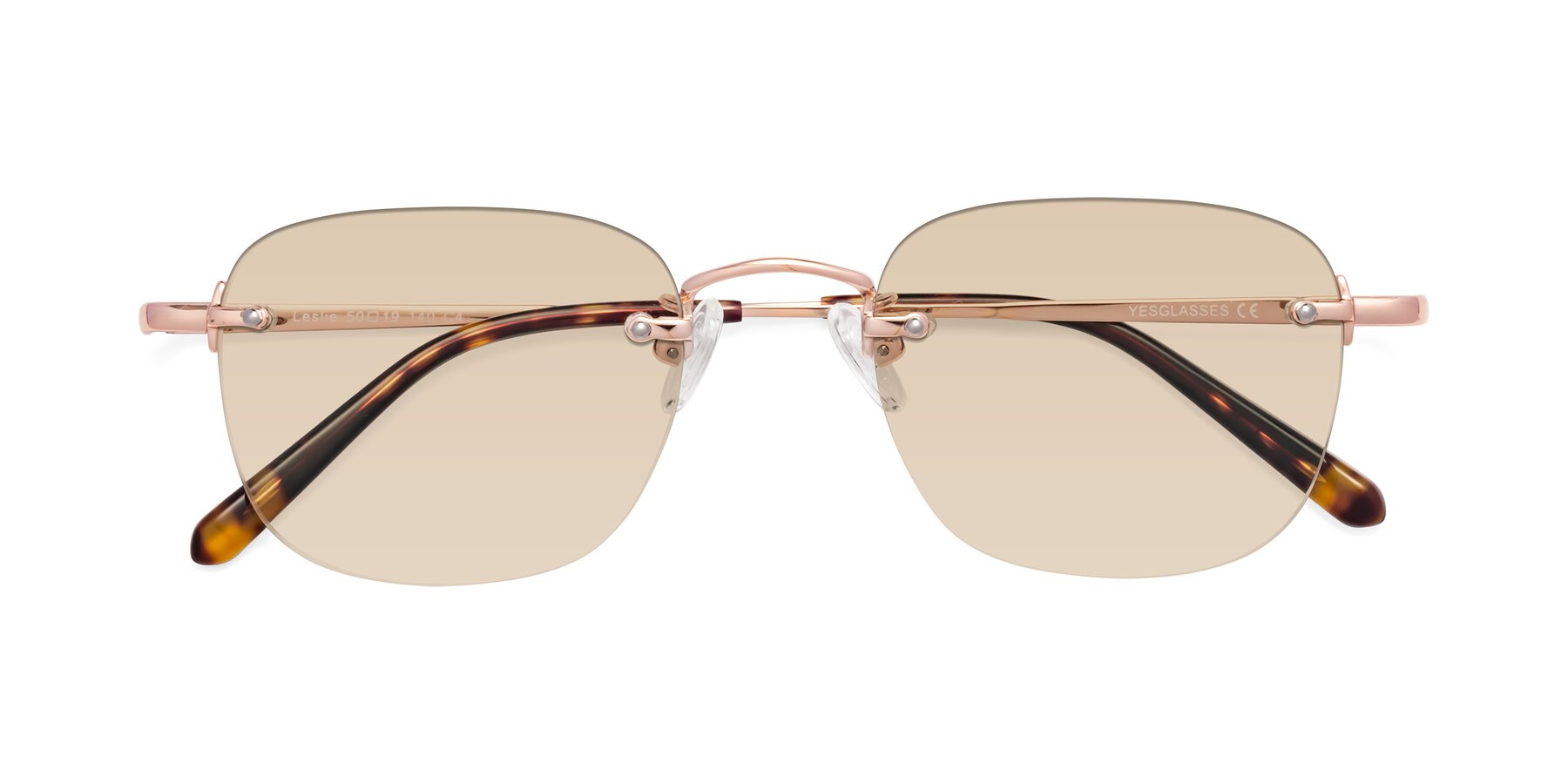 Folded Front of Leslie in Rose Gold with Light Brown Tinted Lenses