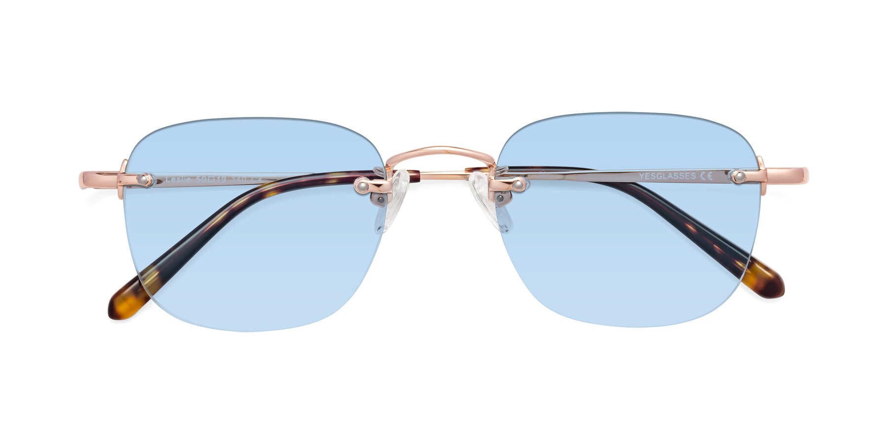Folded Front of Leslie in Rose Gold with Light Blue Tinted Lenses