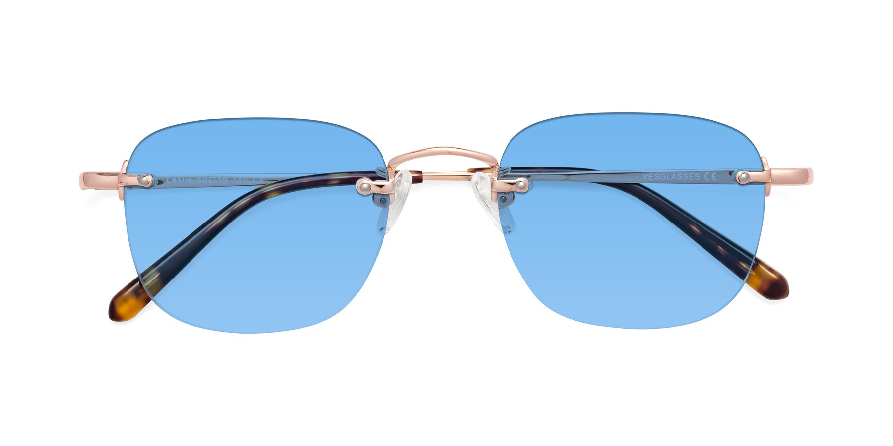 Folded Front of Leslie in Rose Gold with Medium Blue Tinted Lenses