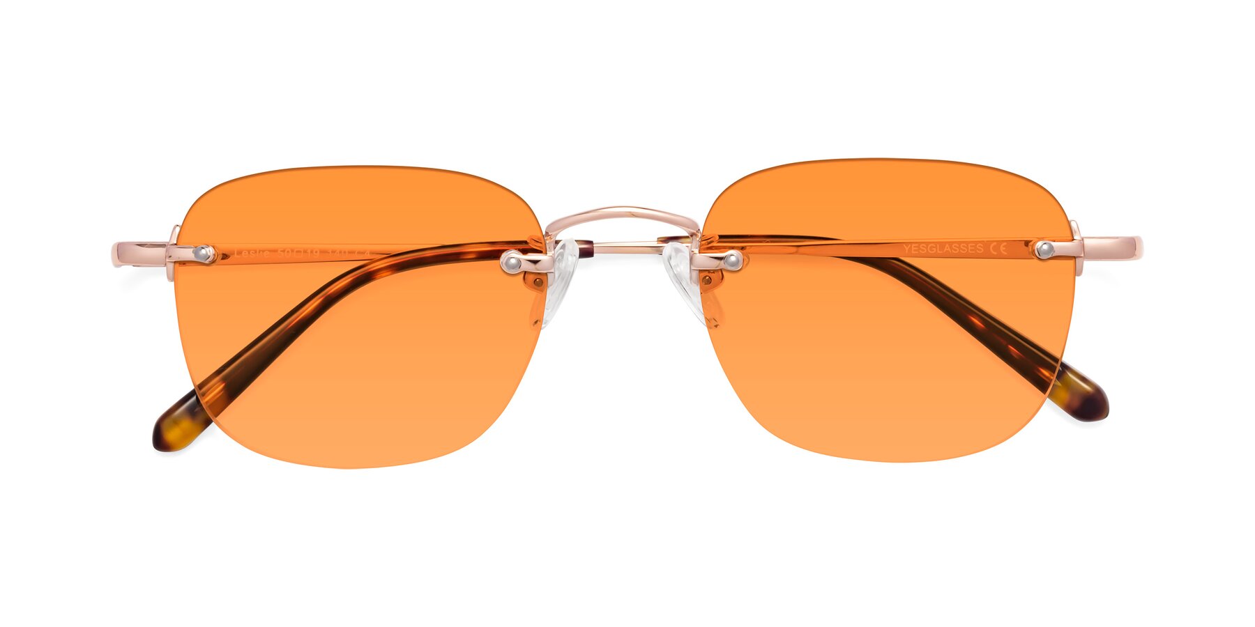 Folded Front of Leslie in Rose Gold with Orange Tinted Lenses