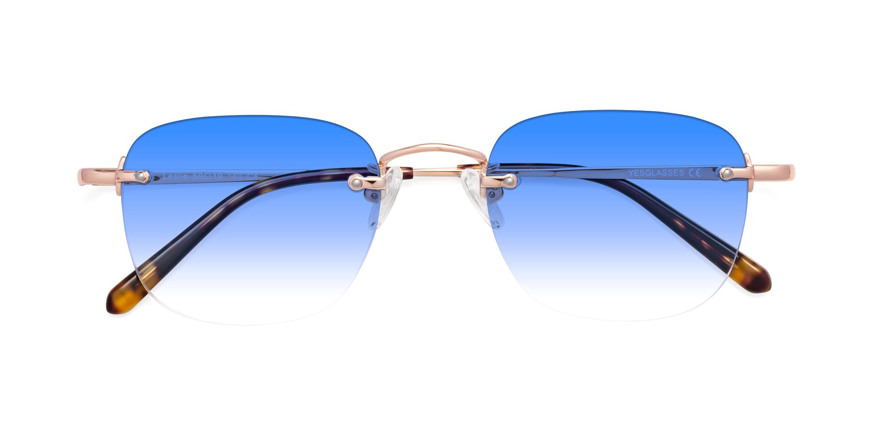 Folded Front of Leslie in Rose Gold with Blue Gradient Lenses