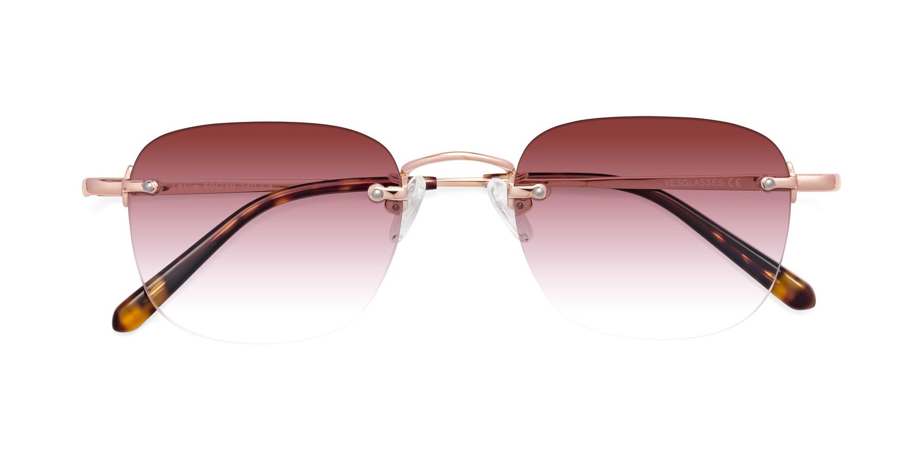 Folded Front of Leslie in Rose Gold with Garnet Gradient Lenses