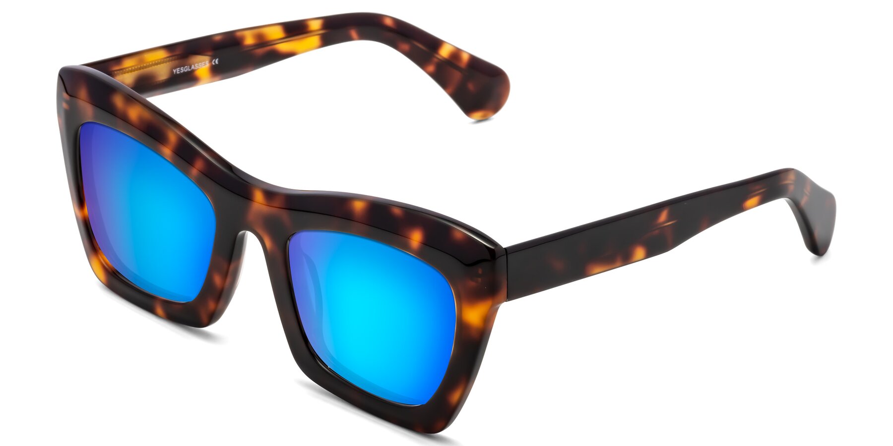 Angle of Randi in Tortoise with Blue Mirrored Lenses