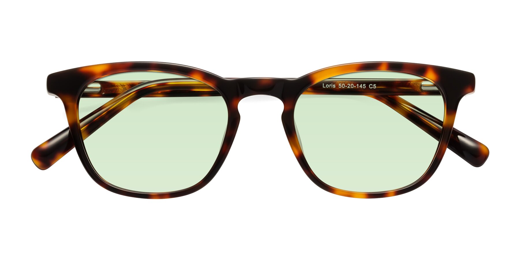 Folded Front of Loris in Tortoise with Light Green Tinted Lenses