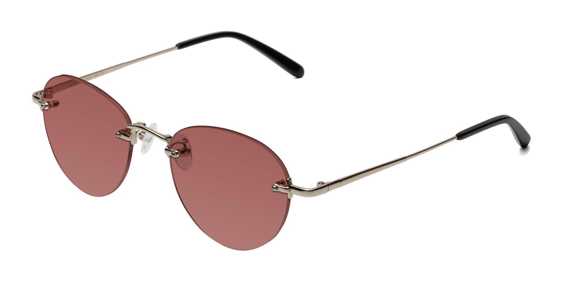 Angle of Quinn in Light Gold with Garnet Tinted Lenses