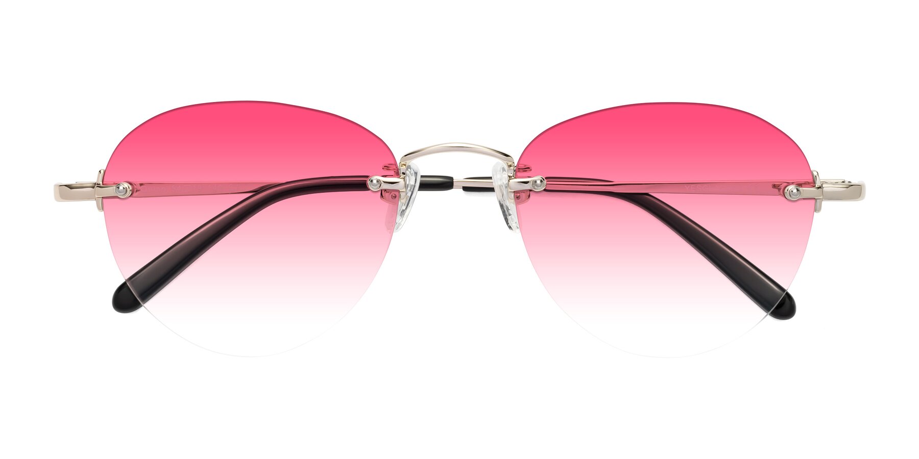Folded Front of Quinn in Light Gold with Pink Gradient Lenses