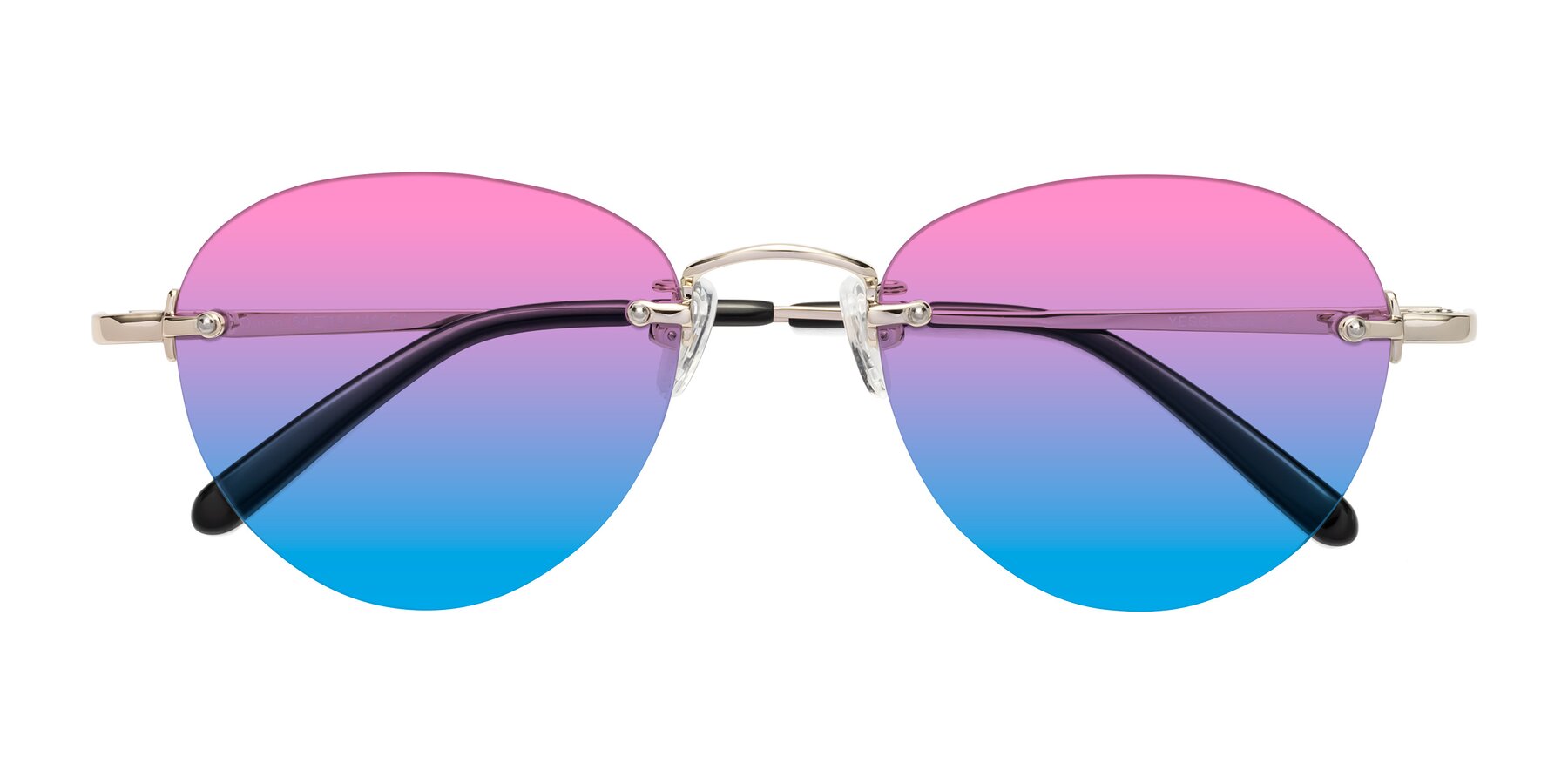 Folded Front of Quinn in Light Gold with Pink / Blue Gradient Lenses