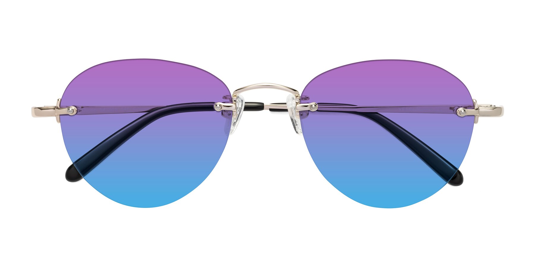 Folded Front of Quinn in Light Gold with Purple / Blue Gradient Lenses