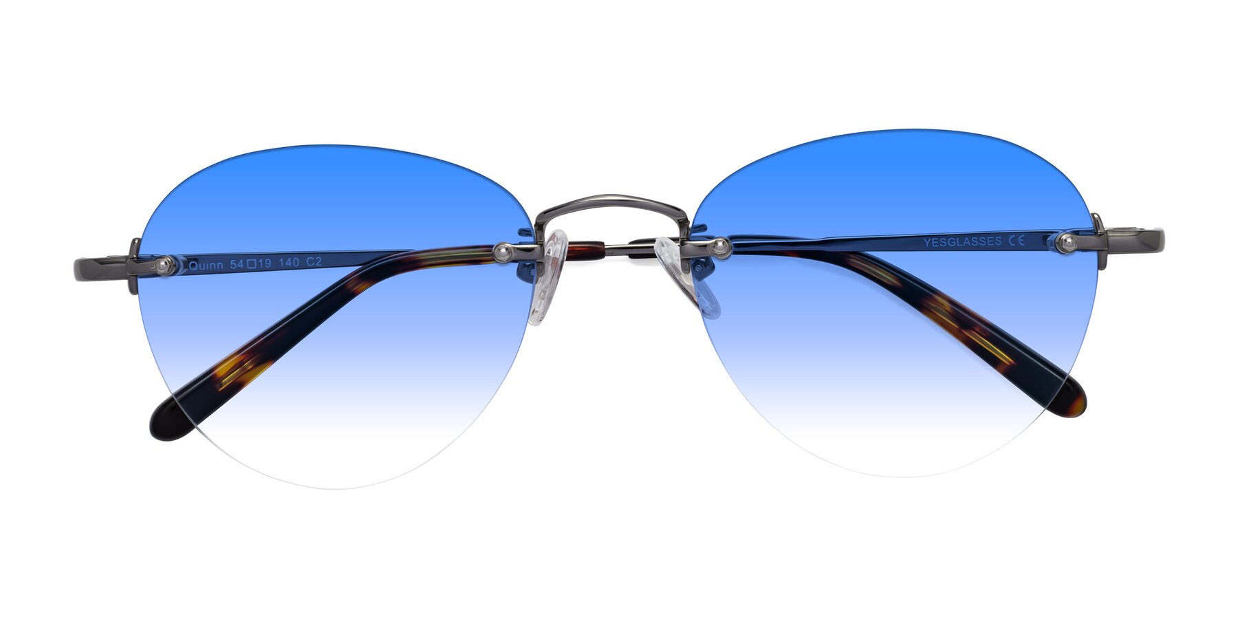 Folded Front of Quinn in Gunmetal with Blue Gradient Lenses