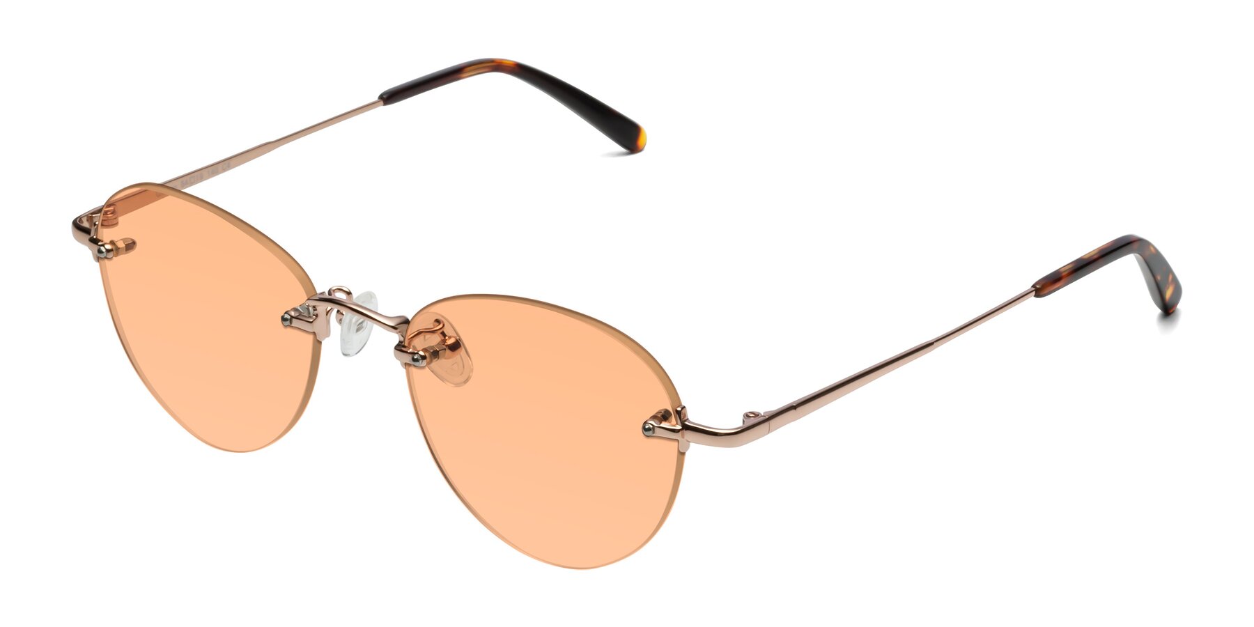 Angle of Quinn in Rose Gold with Light Orange Tinted Lenses