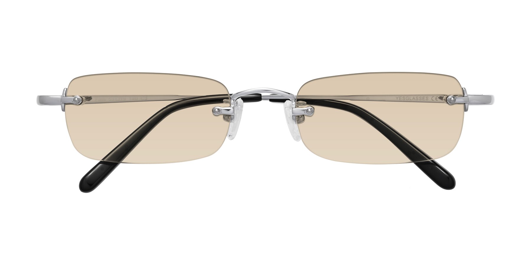 Folded Front of Finn in Silver with Light Brown Tinted Lenses