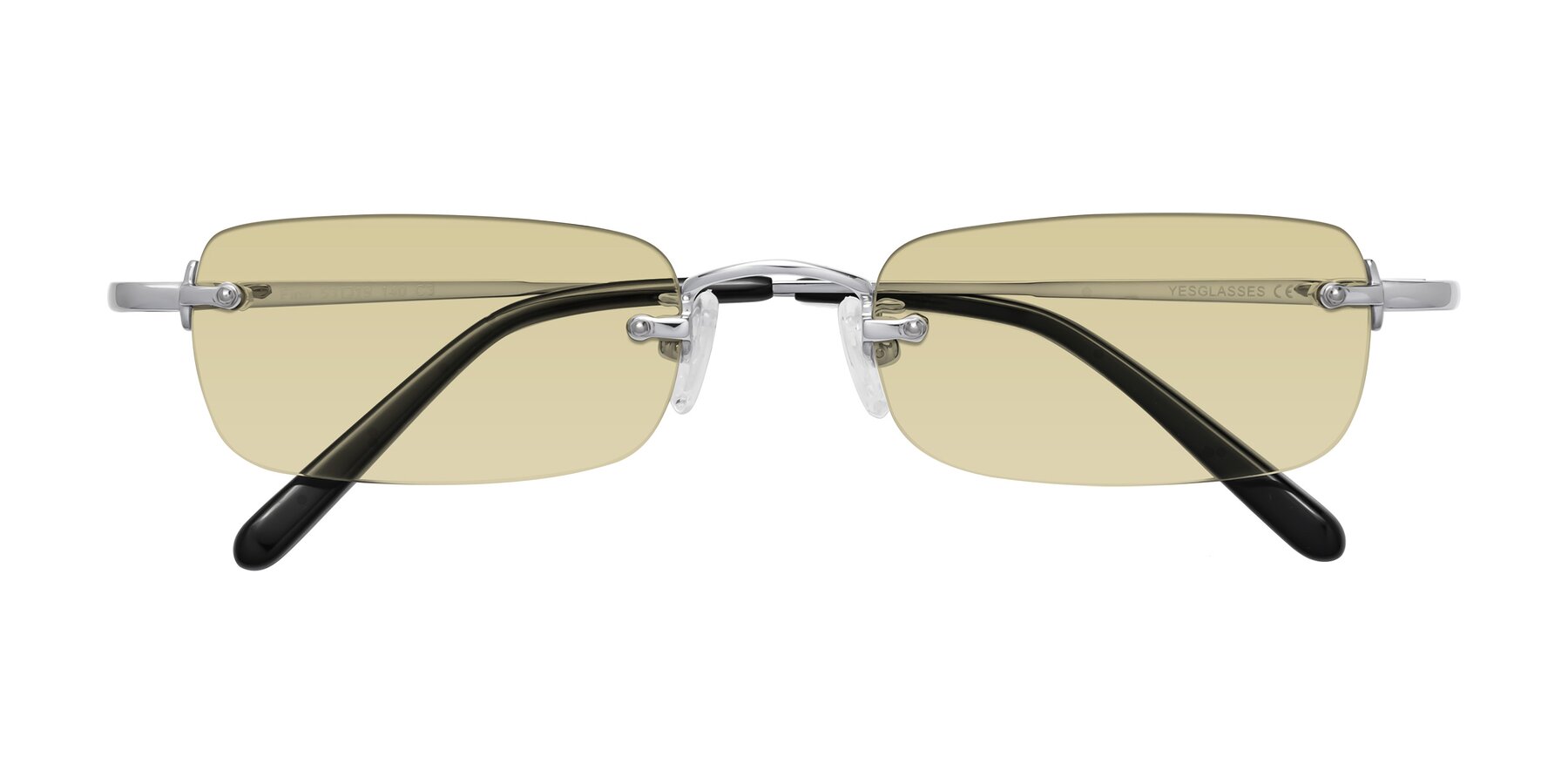 Folded Front of Finn in Silver with Light Champagne Tinted Lenses