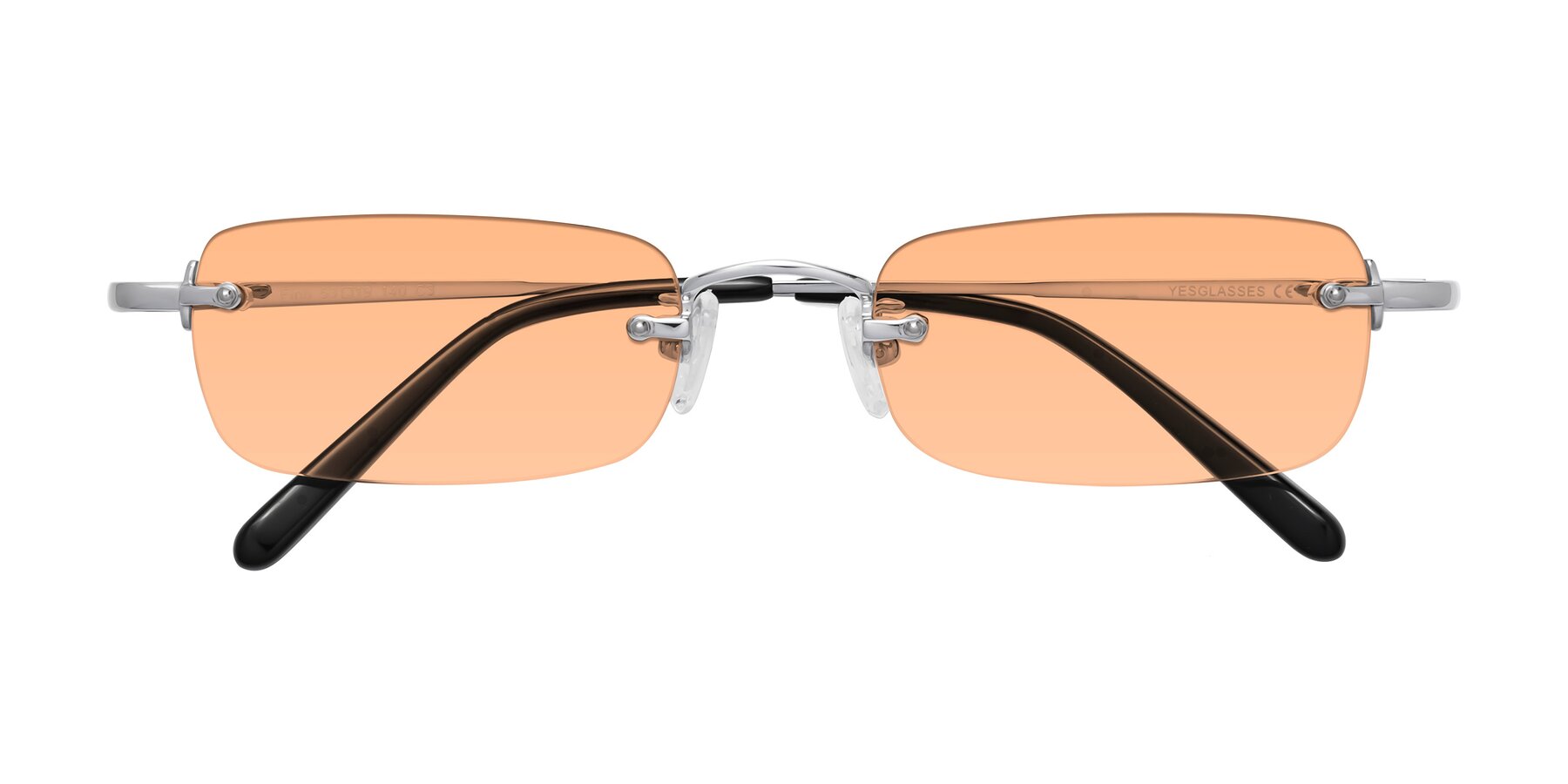 Folded Front of Finn in Silver with Light Orange Tinted Lenses