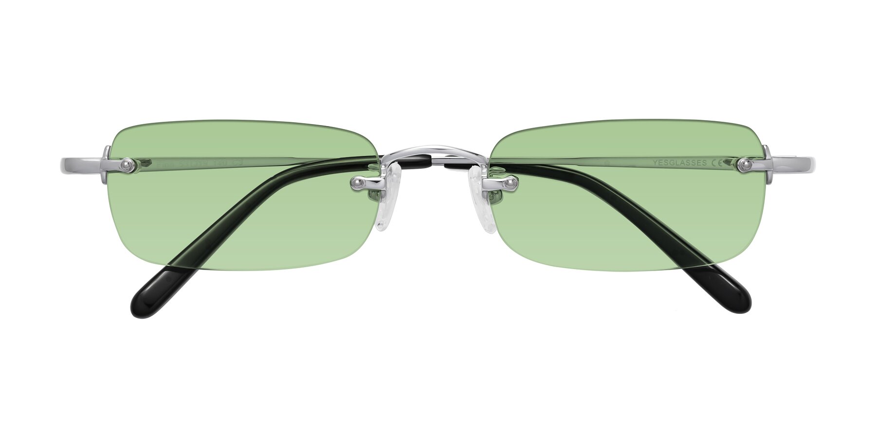 Folded Front of Finn in Silver with Medium Green Tinted Lenses