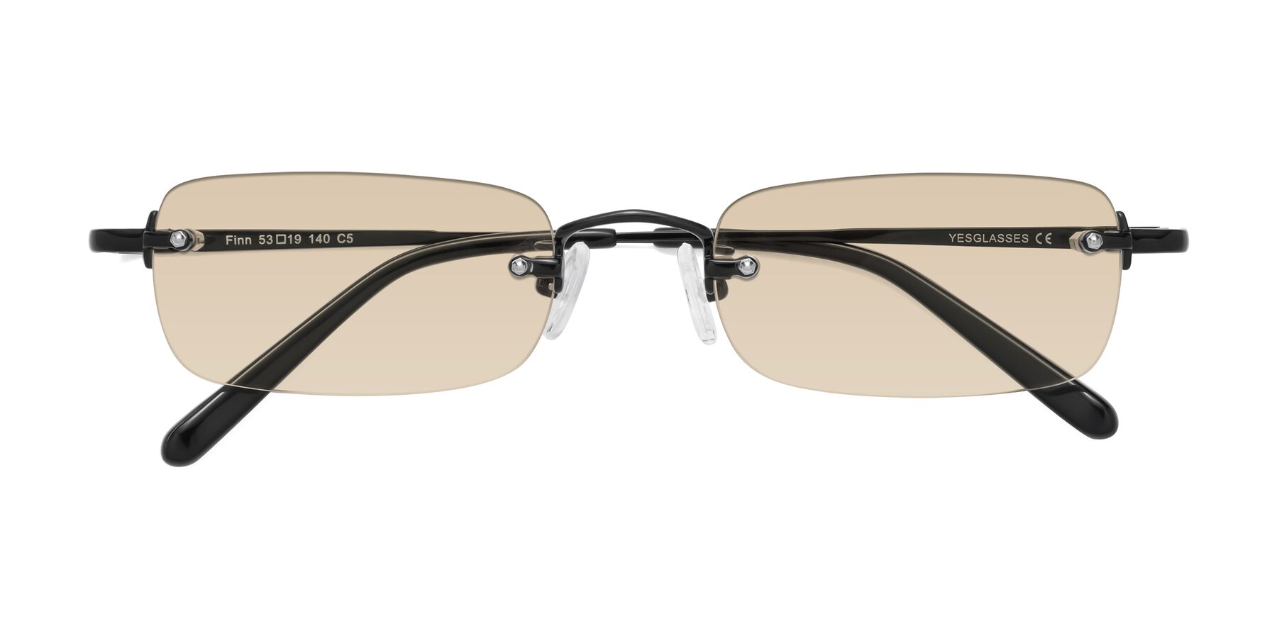 Folded Front of Finn in Black with Light Brown Tinted Lenses