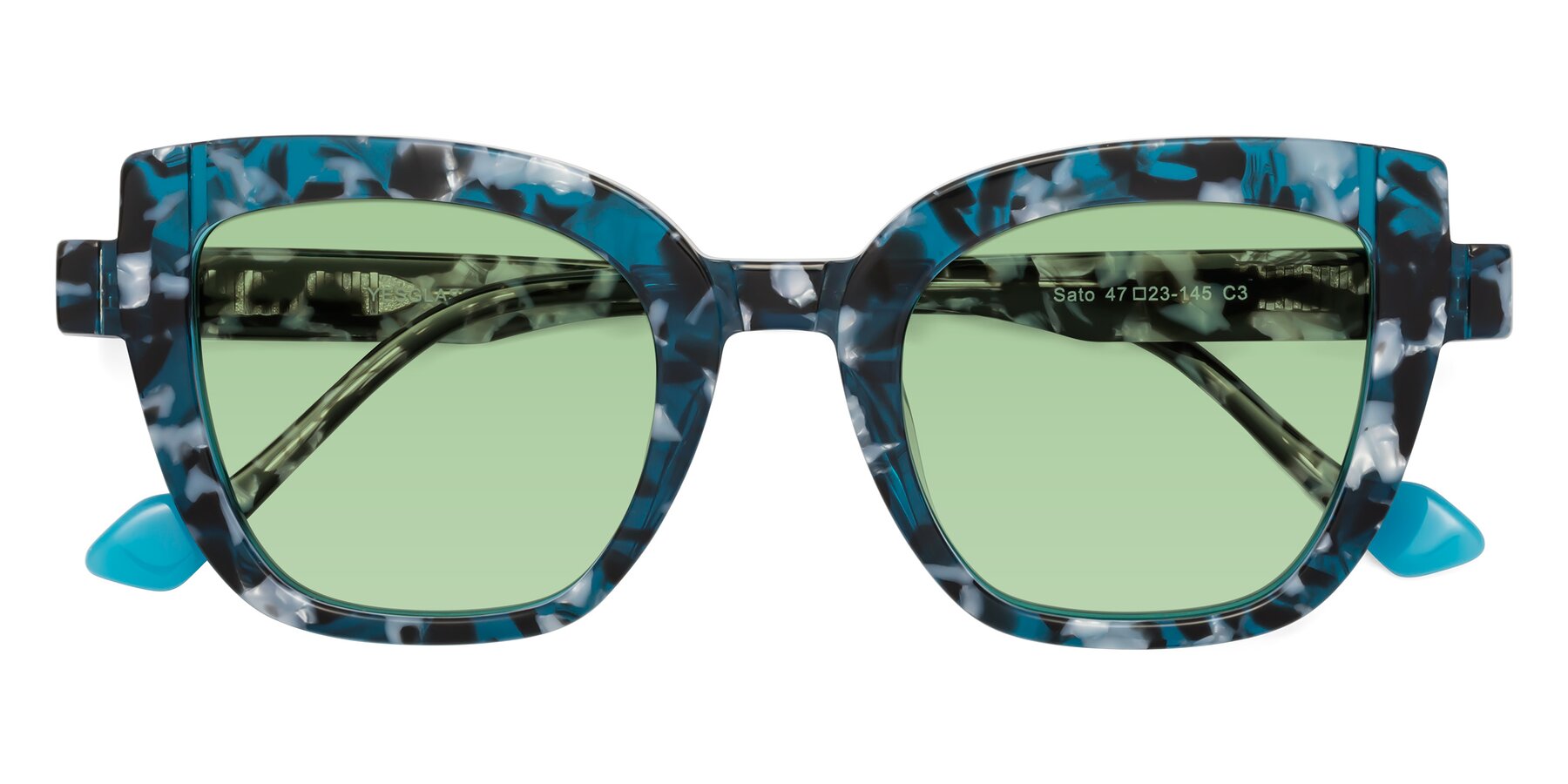 Folded Front of Sato in Tortoise Blue with Medium Green Tinted Lenses