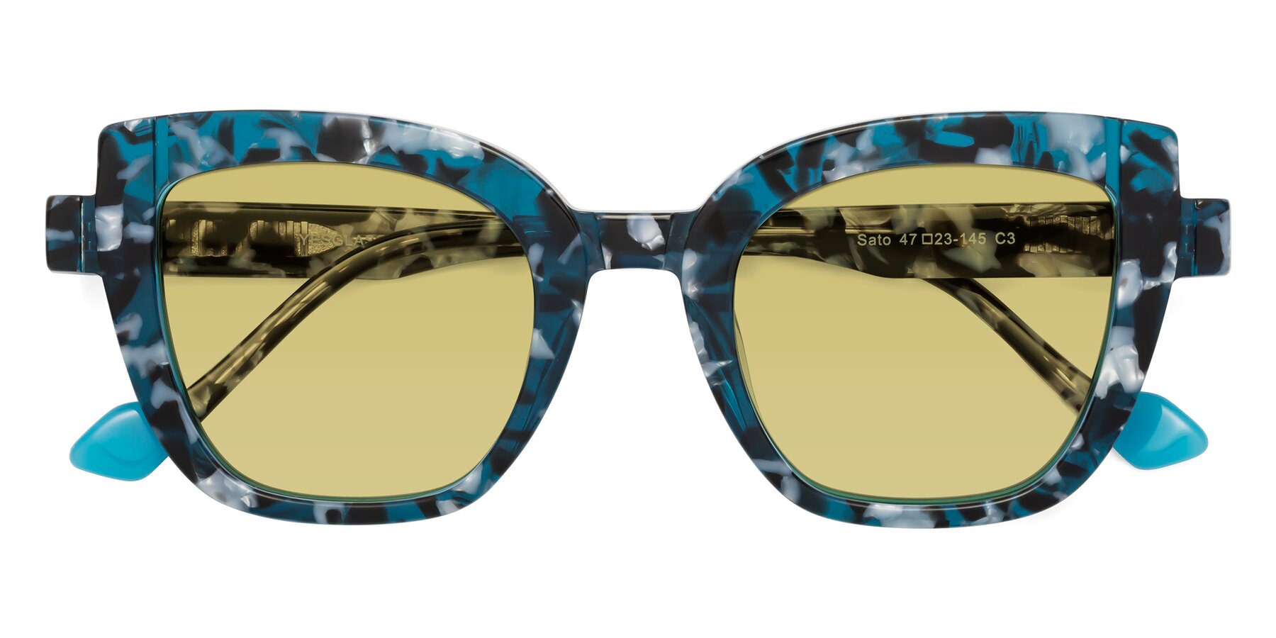 Folded Front of Sato in Tortoise Blue with Medium Champagne Tinted Lenses