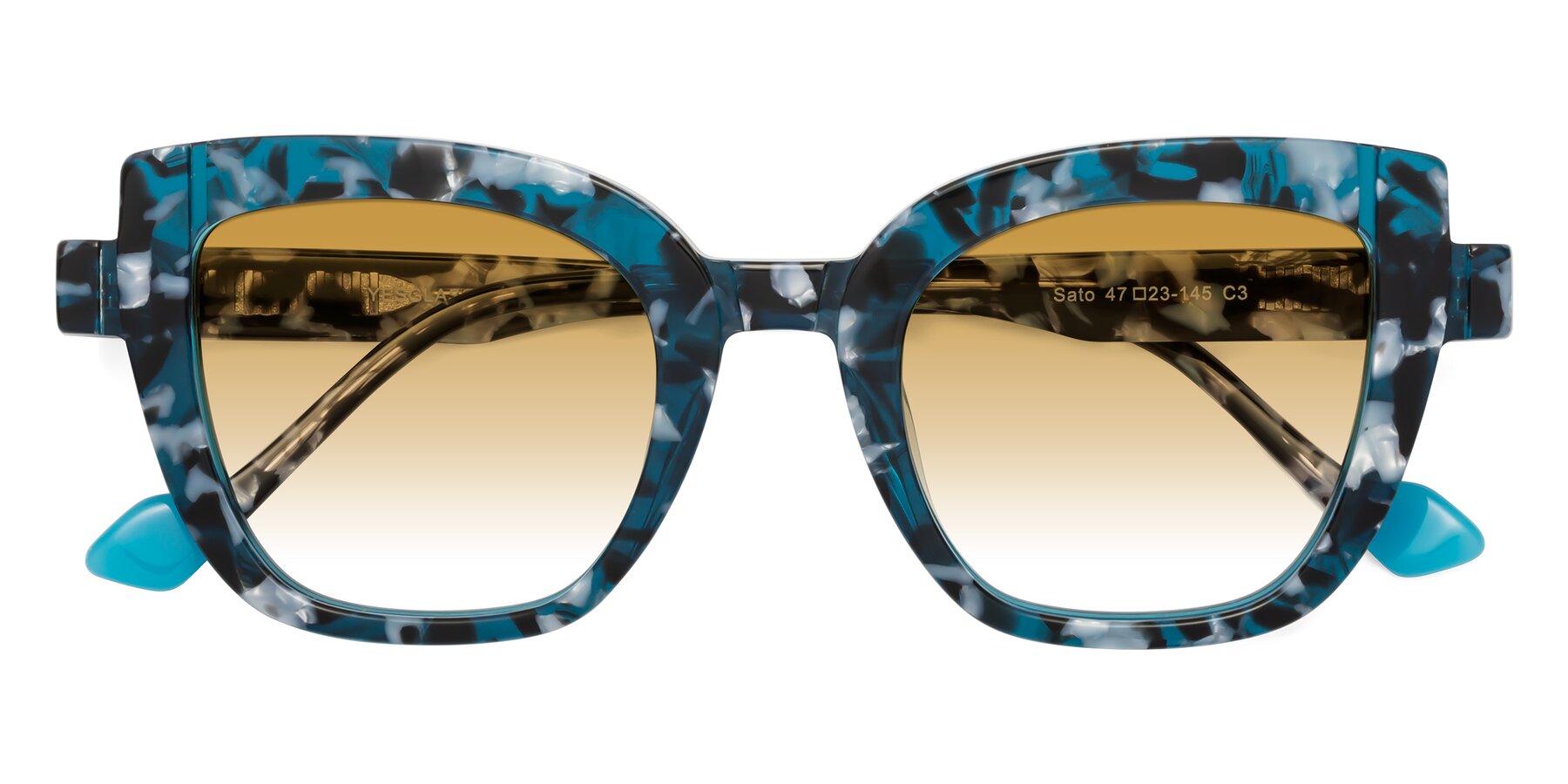 Folded Front of Sato in Tortoise Blue with Champagne Gradient Lenses