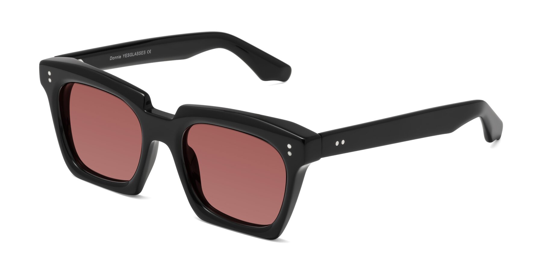 Angle of Donnie in Black with Garnet Tinted Lenses