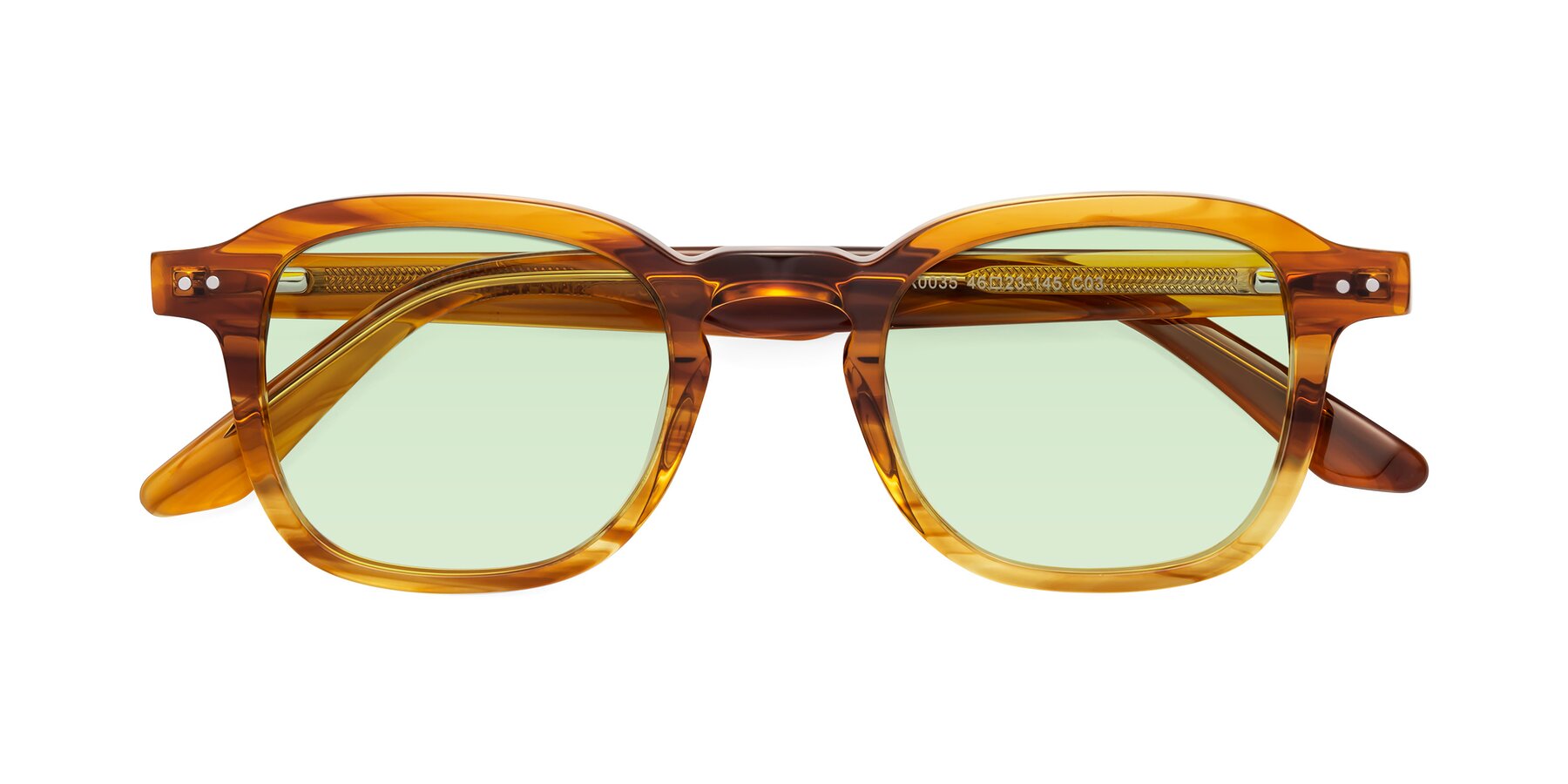 Folded Front of Nice in Striped Amber with Light Green Tinted Lenses