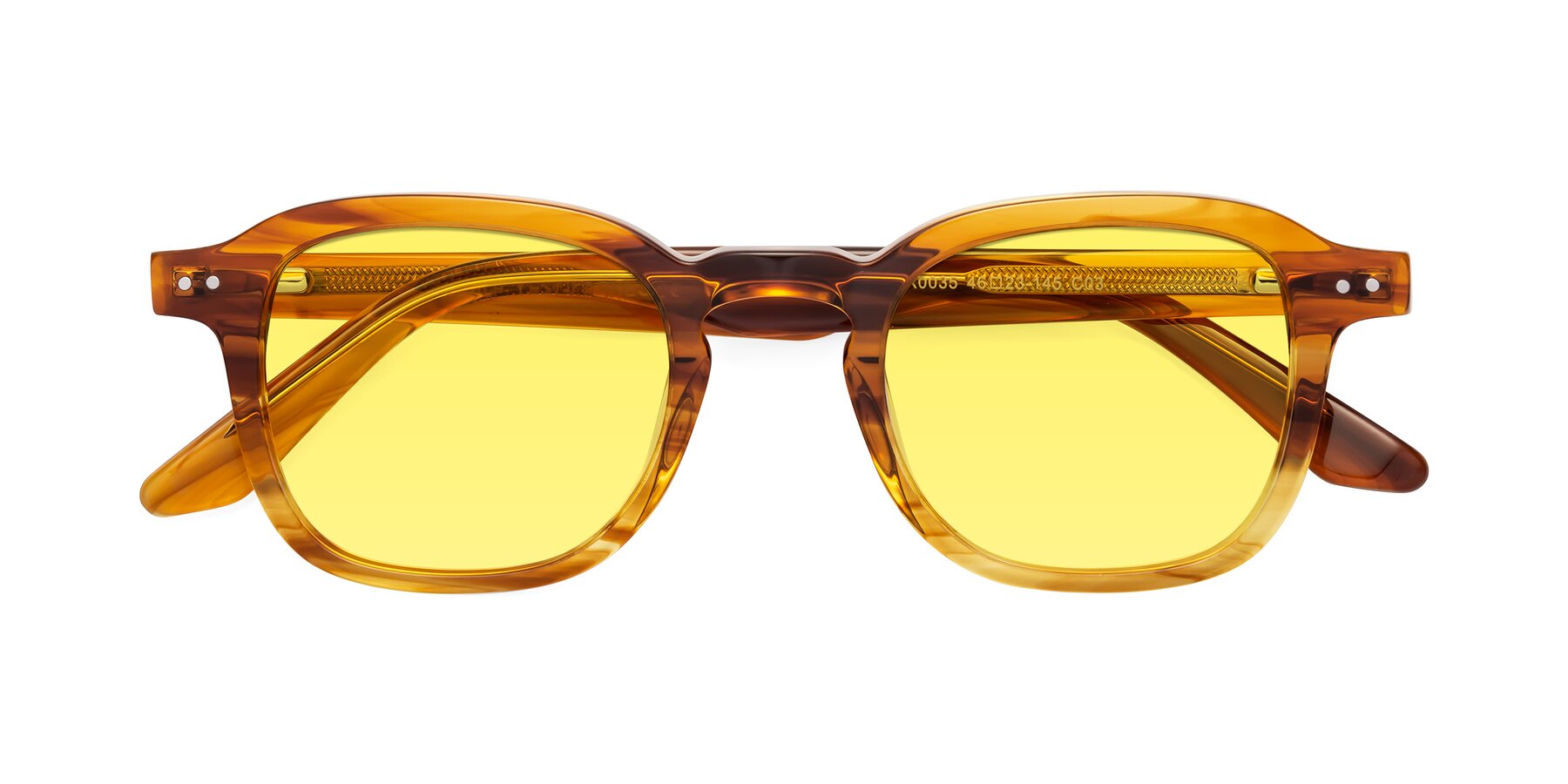 Folded Front of Nice in Striped Amber with Medium Yellow Tinted Lenses