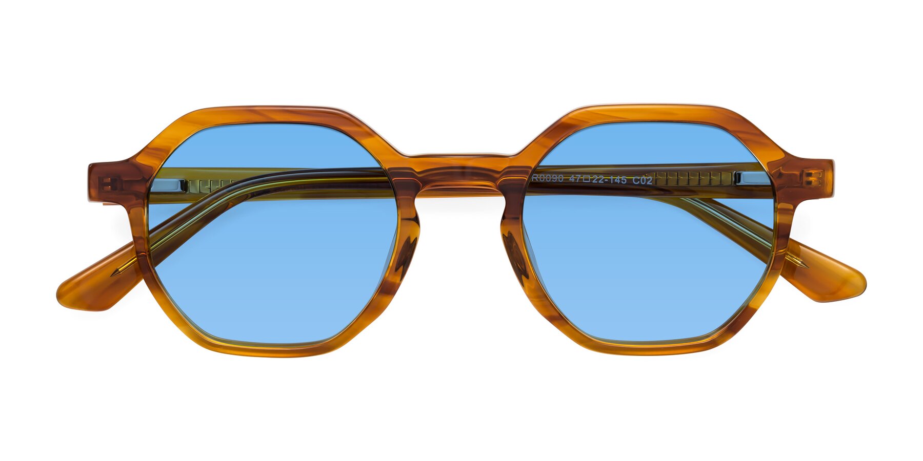 Folded Front of Lucian in Striped Amber with Medium Blue Tinted Lenses