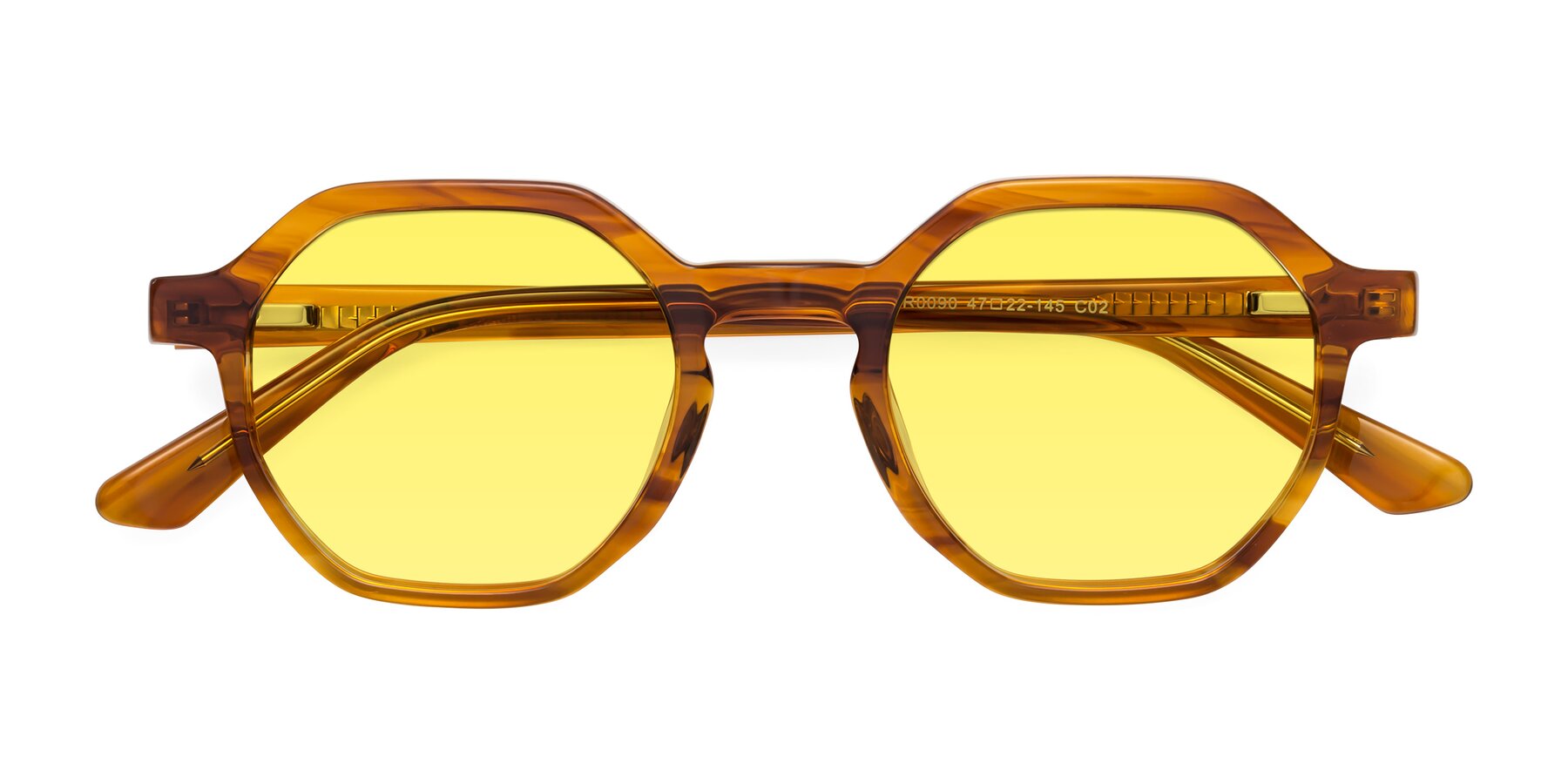 Folded Front of Lucian in Striped Amber with Medium Yellow Tinted Lenses