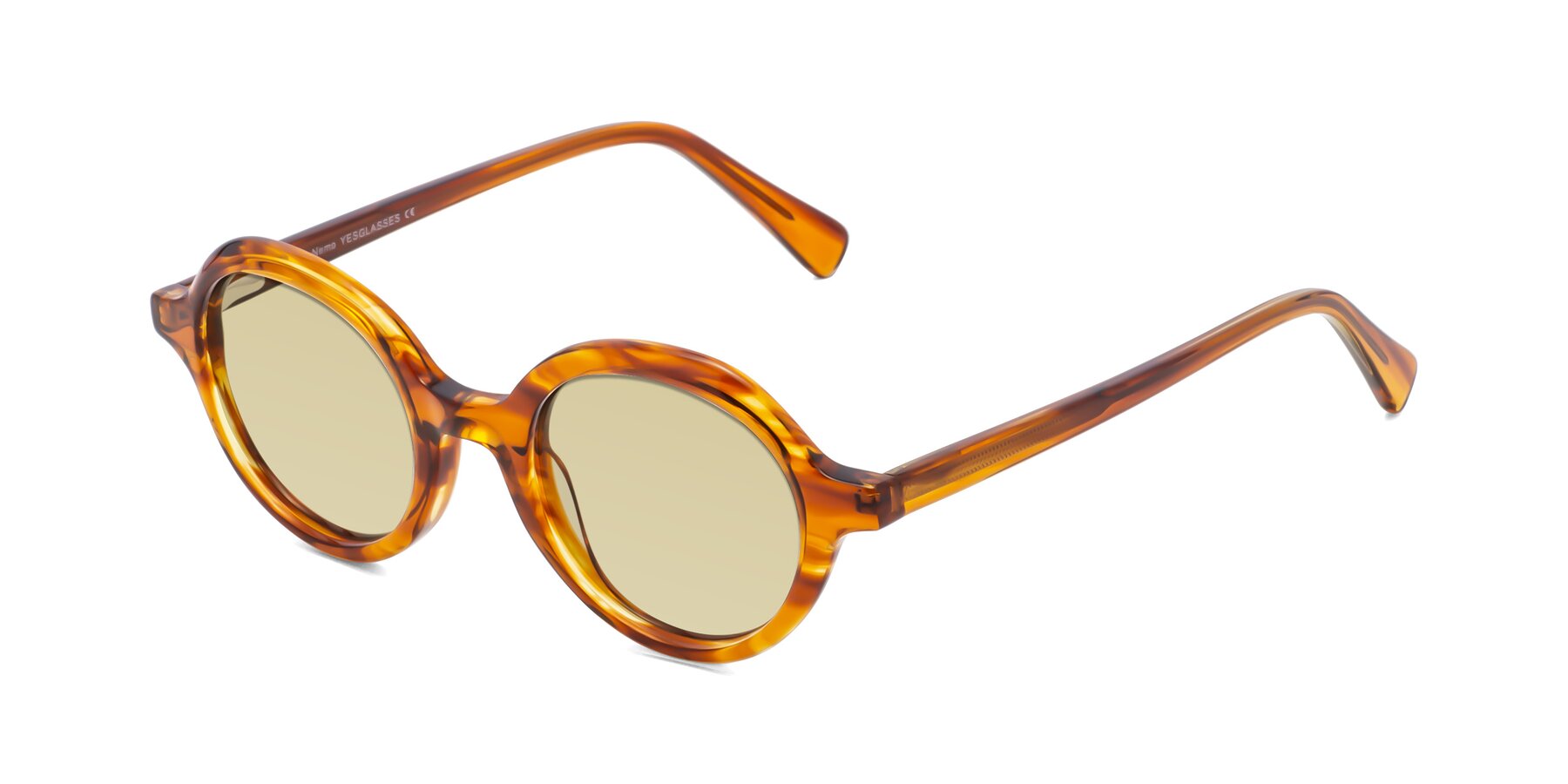 Angle of Nemo in Striped Amber with Light Champagne Tinted Lenses